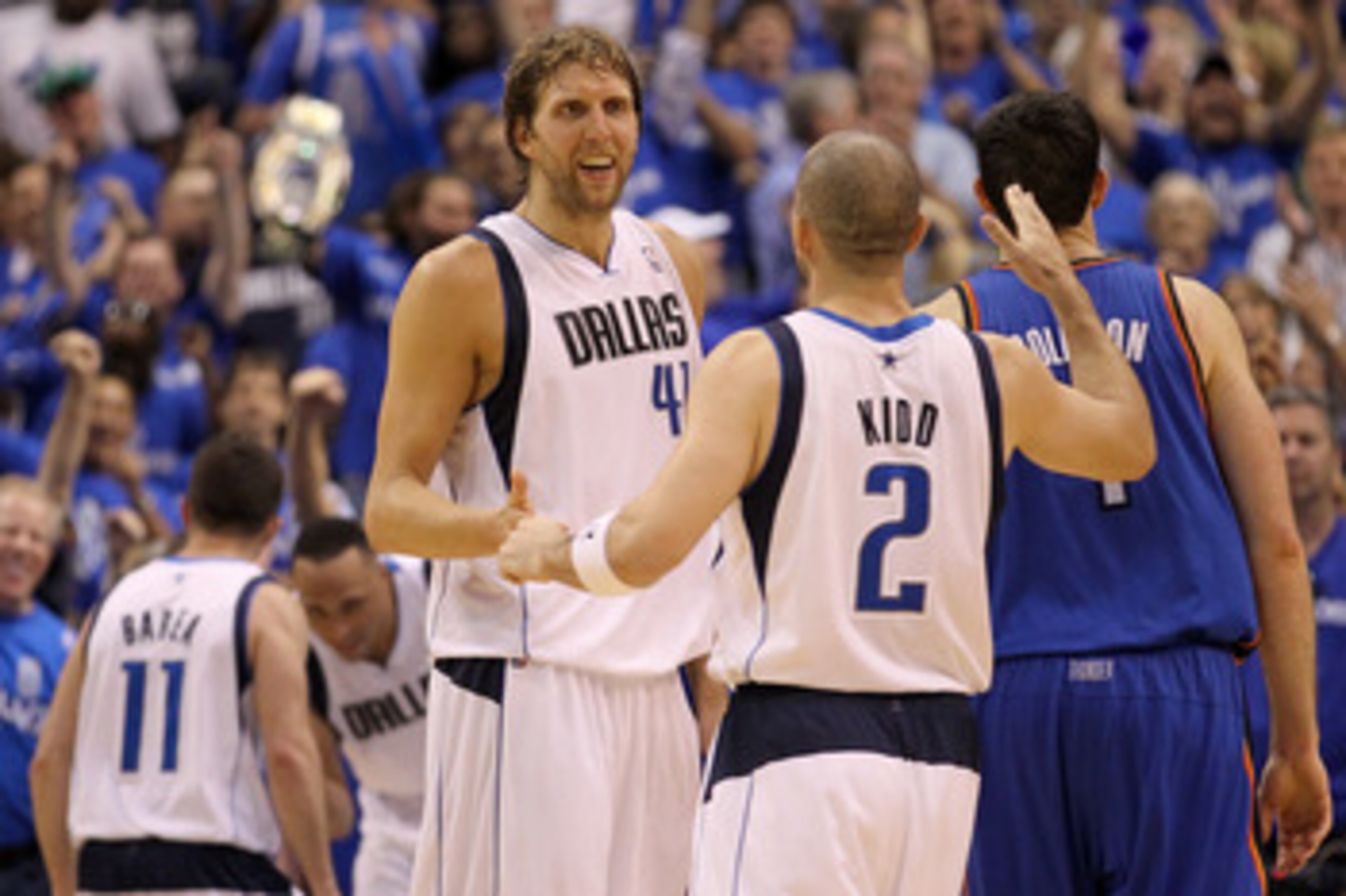 DALLAS, TX - MAY 25:  Dirk Nowitzki #41 and Jason Kidd #2 of the Dallas Mavericks celebrate late in the fourth quarter while taking on the Oklahoma City Thunder in Game Five of the Western Conference Finals during the 2011 NBA Playoffs at American Airline