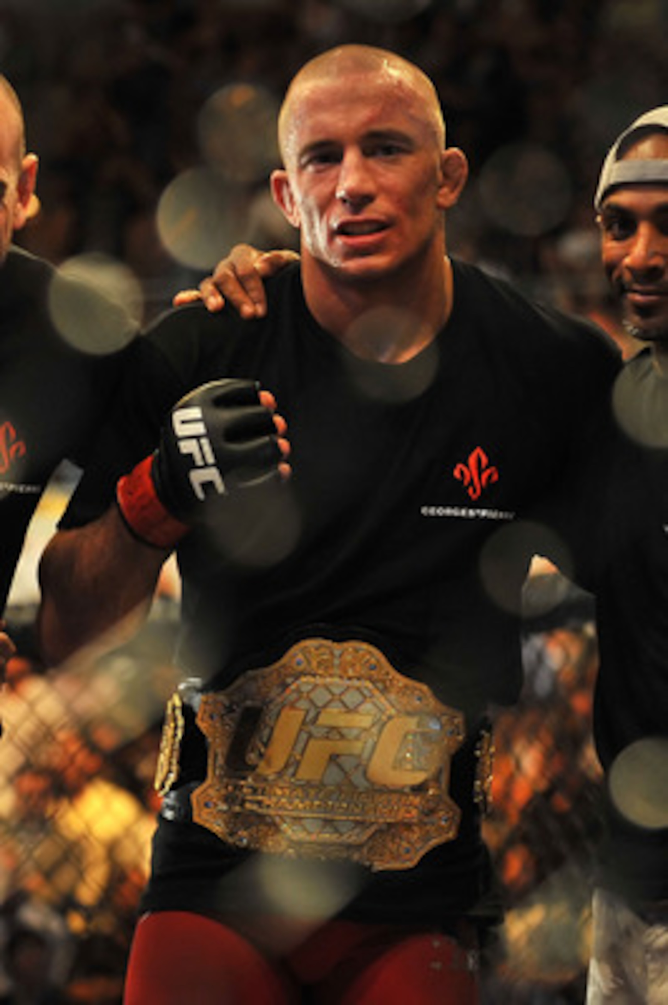 LAS VEGAS - JULY 11:  Georges St. Pierre celebrates his victory against Thiago Alves during their welterweight title bout during UFC 100 on July 11, 2009 in Las Vegas, Nevada. St. Pierre defeated Alves by unanimous decision.  (Photo by Jon Kopaloff/Getty