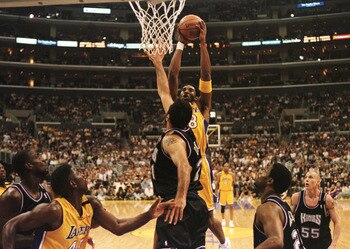 27 Apr 2000: Guard Kobe Bryant #8 of the Los Angeles Lakers shoots over center Vlade Divac #21 of the Sacramento Kings during their first round playoff game at Staples Center in Los Angeles, California.