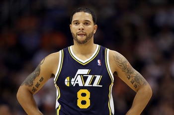 PHOENIX - OCTOBER 12:  Deron Williams #8 of the Utah Jazz in action during the preseason NBA game against the Phoenix Suns at US Airways Center on October 12, 2010 in Phoenix, Arizona. NOTE TO USER: User expressly acknowledges and agrees that, by download