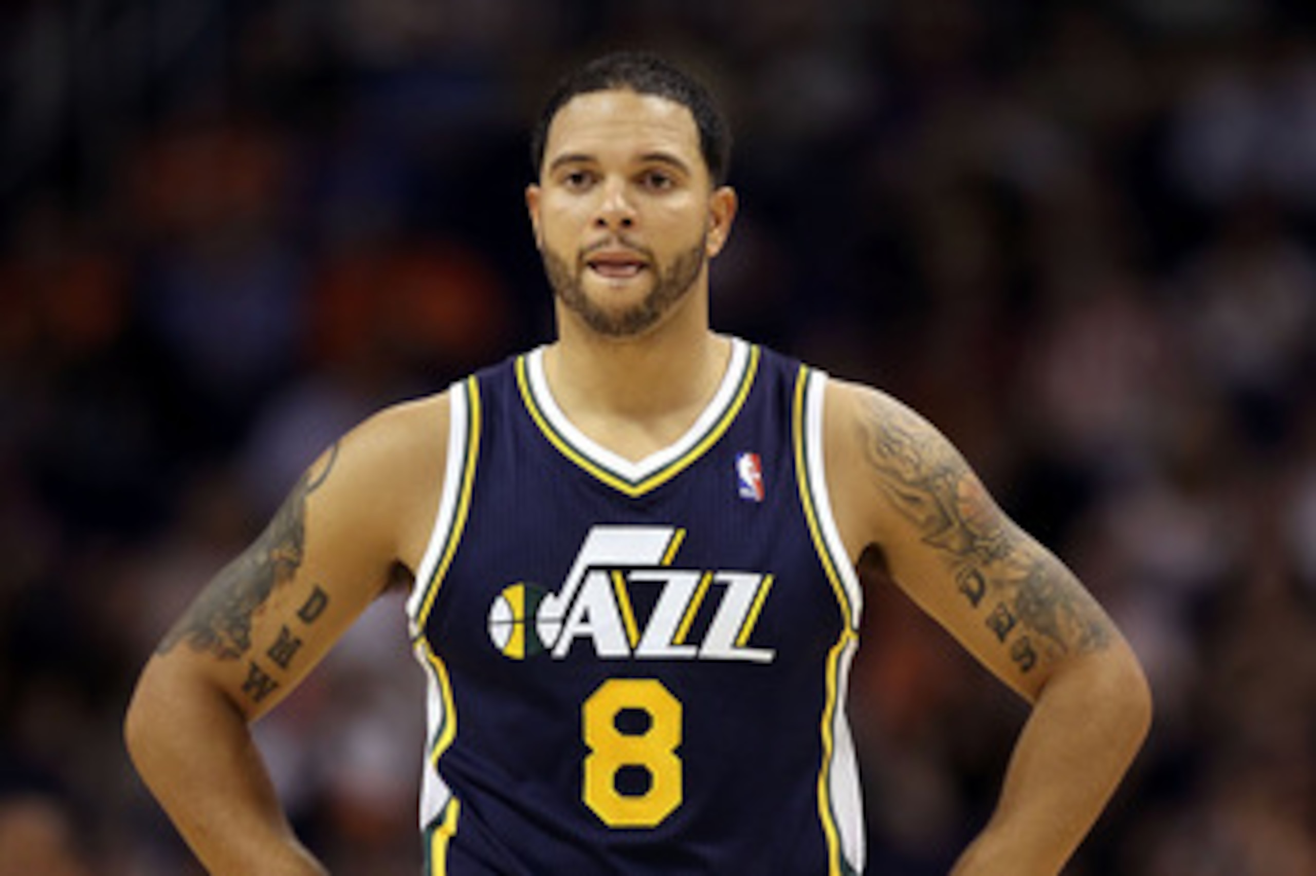 PHOENIX - OCTOBER 12:  Deron Williams #8 of the Utah Jazz in action during the preseason NBA game against the Phoenix Suns at US Airways Center on October 12, 2010 in Phoenix, Arizona. NOTE TO USER: User expressly acknowledges and agrees that, by download
