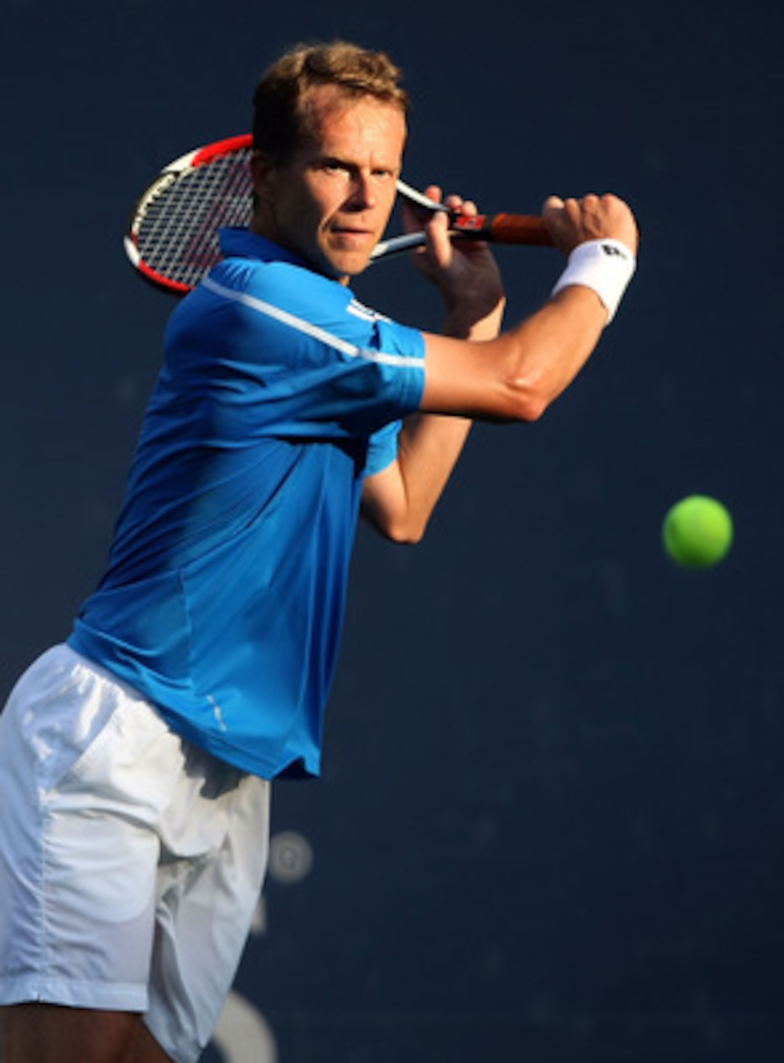 LOS ANGELES, CA - JULY 29:  Stefan Edberg returns a shot to Jim Courier during the Legends match at the LA Tennis Open Day Three at Los Angeles Tennis Center - UCLA on July 29, 2009 in Los Angeles, California.  Courier defeated Edberg 4-6, 6-4, 11-9.  (Ph