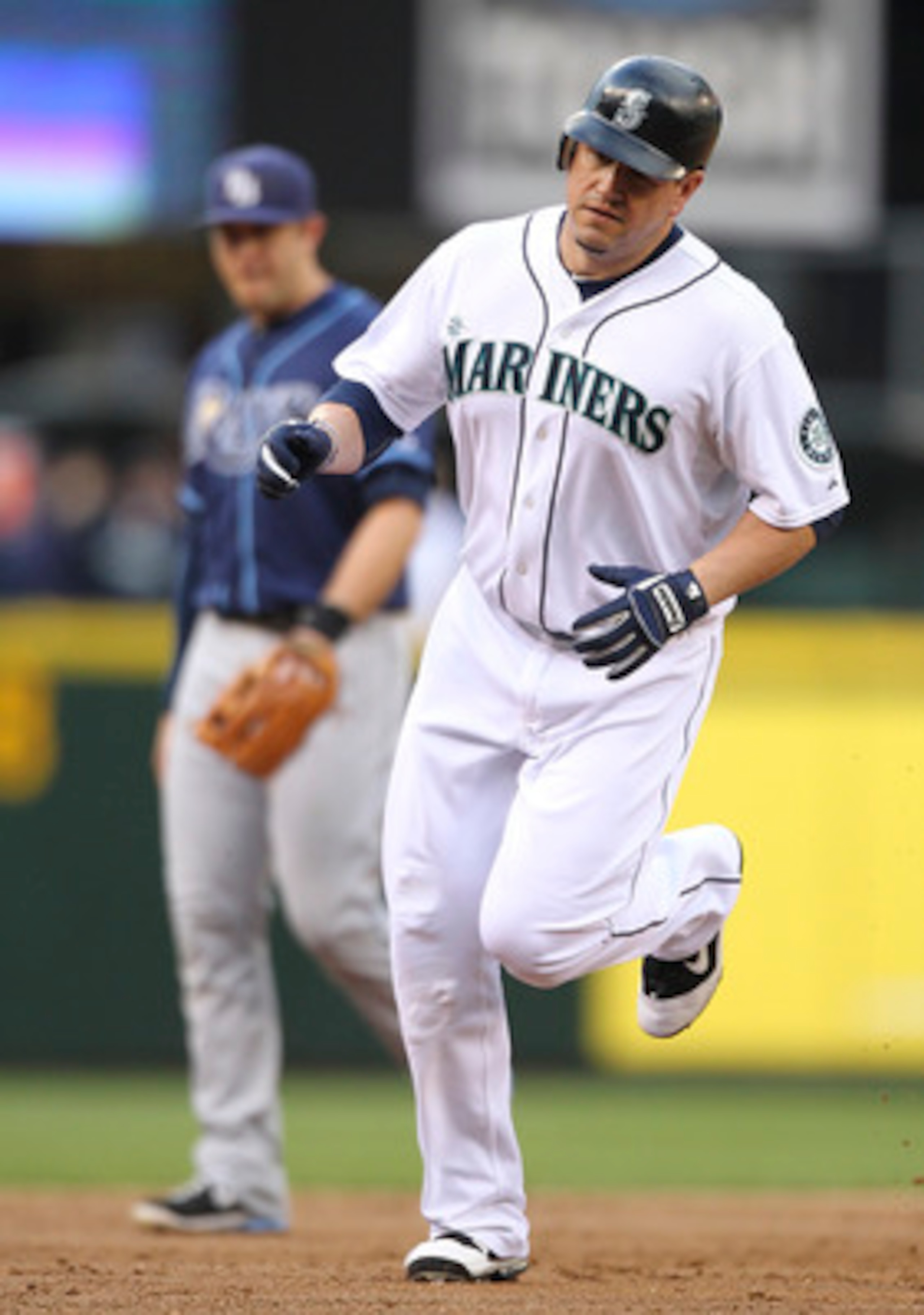 SEATTLE - JUNE 02:  Jack Cust #29 of the Seattle Mariners rounds the bases after hitting a homerun against the Tampa Bay Rays at Safeco Field on June 2, 2011 in Seattle, Washington. (Photo by Otto Greule Jr/Getty Images)