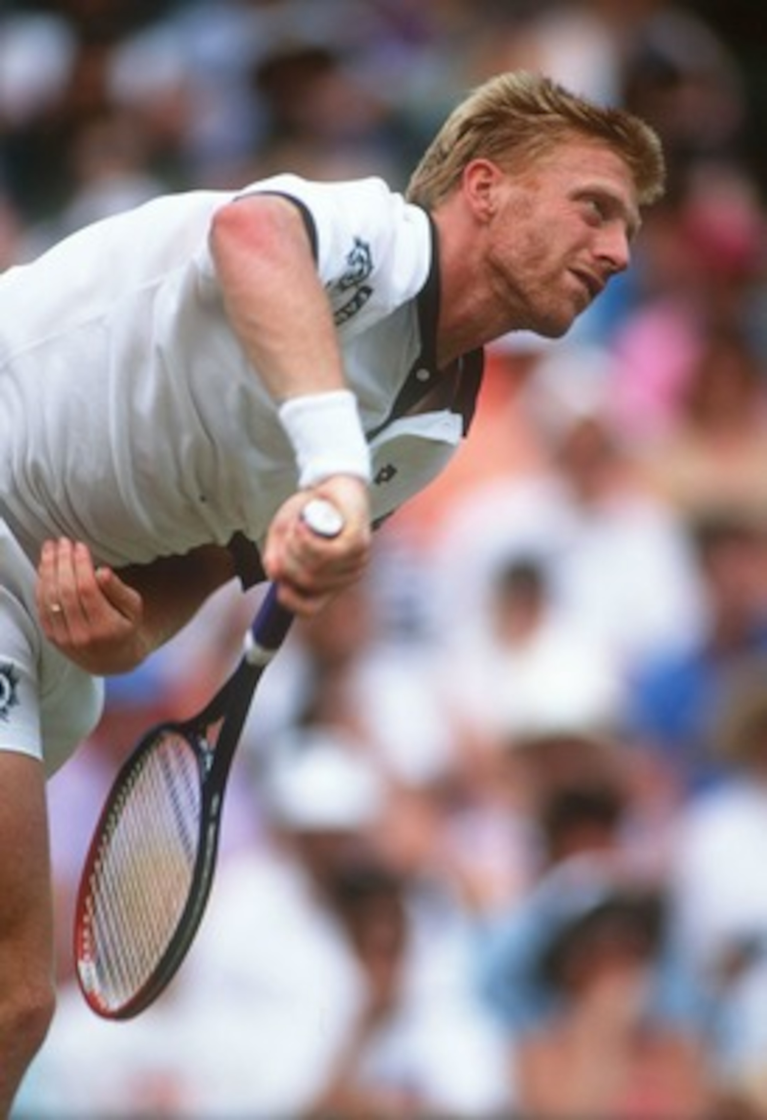 1 JUL 1994:  BORIS BECKER OF GERMANY SERVES DURING HIS SEMI-FINAL MATCH WITH GORAN IVANISEVIC OF CROATIA IN THE 1994 WIMBLEDON CHAMPIONSHIPS.  IVANISEVIC WON IN STRAIGHT SETS 6-2, 7-6 (8-6), 6-4.   Mandatory Credit: Bob Martin/ALLSPORT