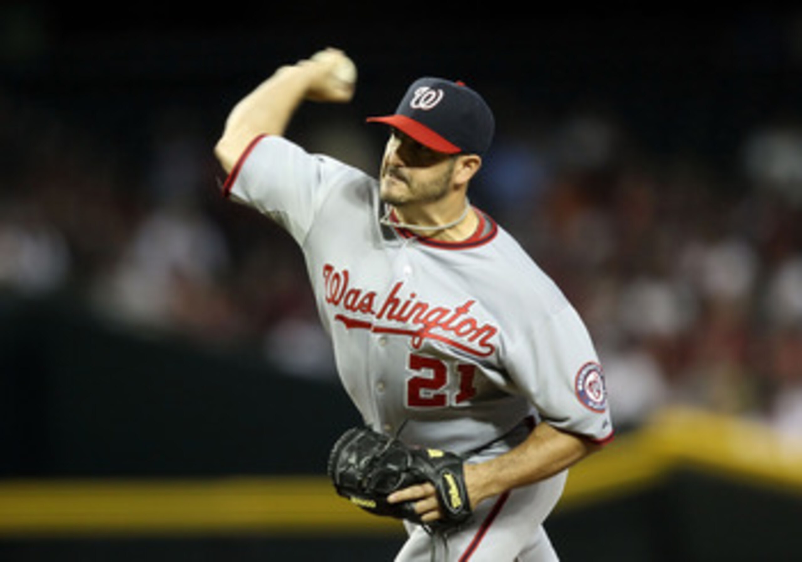 PHOENIX, AZ - JUNE 05:  Starting pitcher Jason Marquis #21 of the Washington Nationals pitches against the Arizona Diamondbacks during the Major League Baseball game at Chase Field on June 5, 2011 in Phoenix, Arizona.  (Photo by Christian Petersen/Getty I