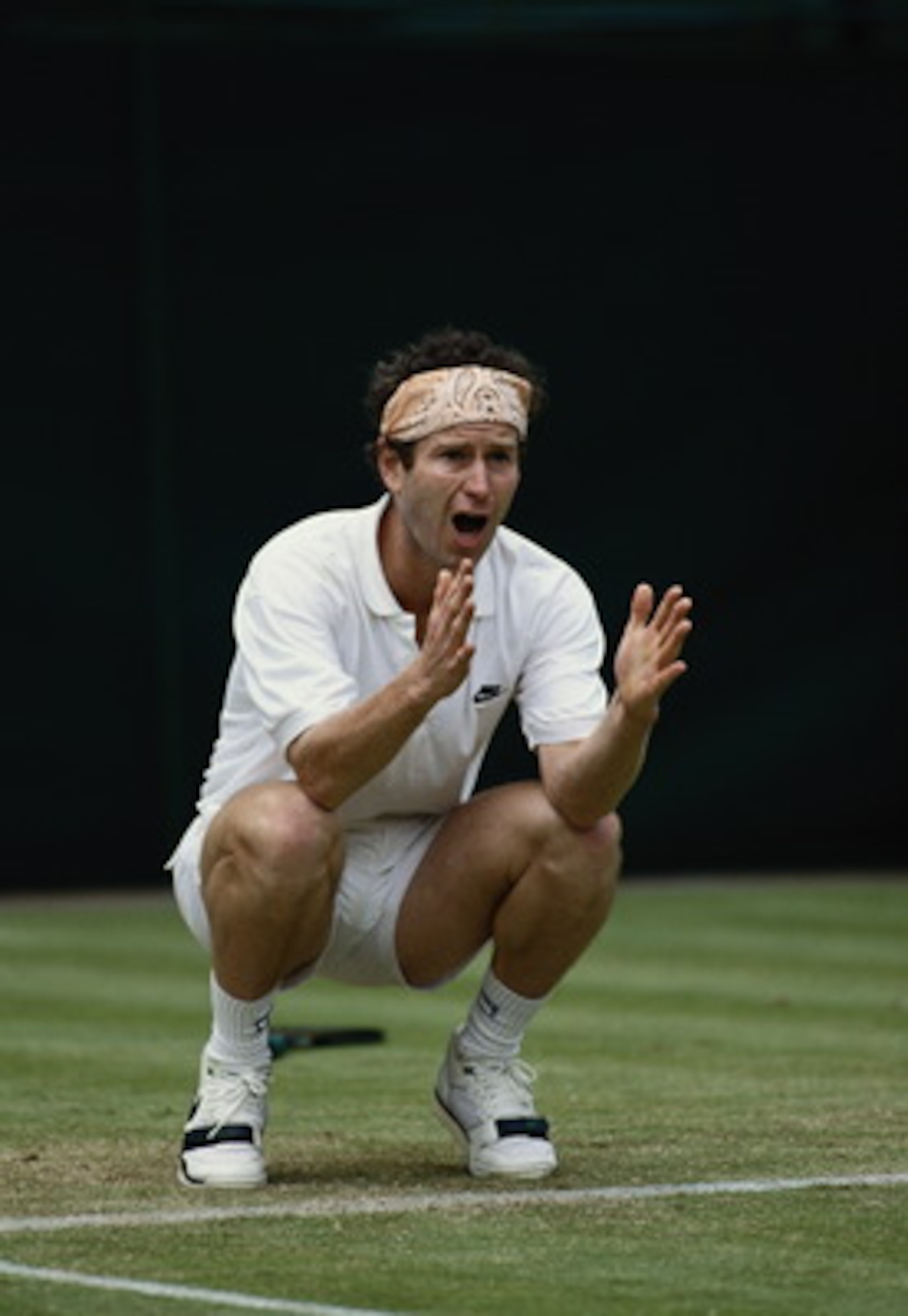 30 Jun 1991:  John McEnroe of the USA argues with an umpire over a decision called during the Wimbledon Lawn Tennis Championship held at the All England Lawn Tennis and Croquet Club, in London. \ Mandatory Credit: Simon Bruty /Allsport