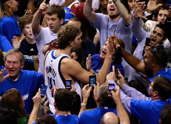 DALLAS, TX - JUNE 09:  Dirk Nowitzki #41 of the Dallas Mavericks celebrates with fans after the won 112-103 against the Miami Heat in Game Five of the 2011 NBA Finals at American Airlines Center on June 9, 2011 in Dallas, Texas.  NOTE TO USER: User expres