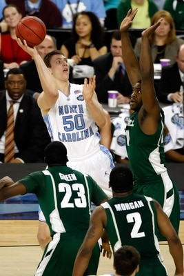 DETROIT - APRIL 06:  Tyler Hansbrough #50 of the North Carolina Tar Heels shoots the ball over Marquise Gray #41 of the Michigan State Spartans in the first half during the 2009 NCAA Division I Men's Basketball National Championship game at Ford Field on