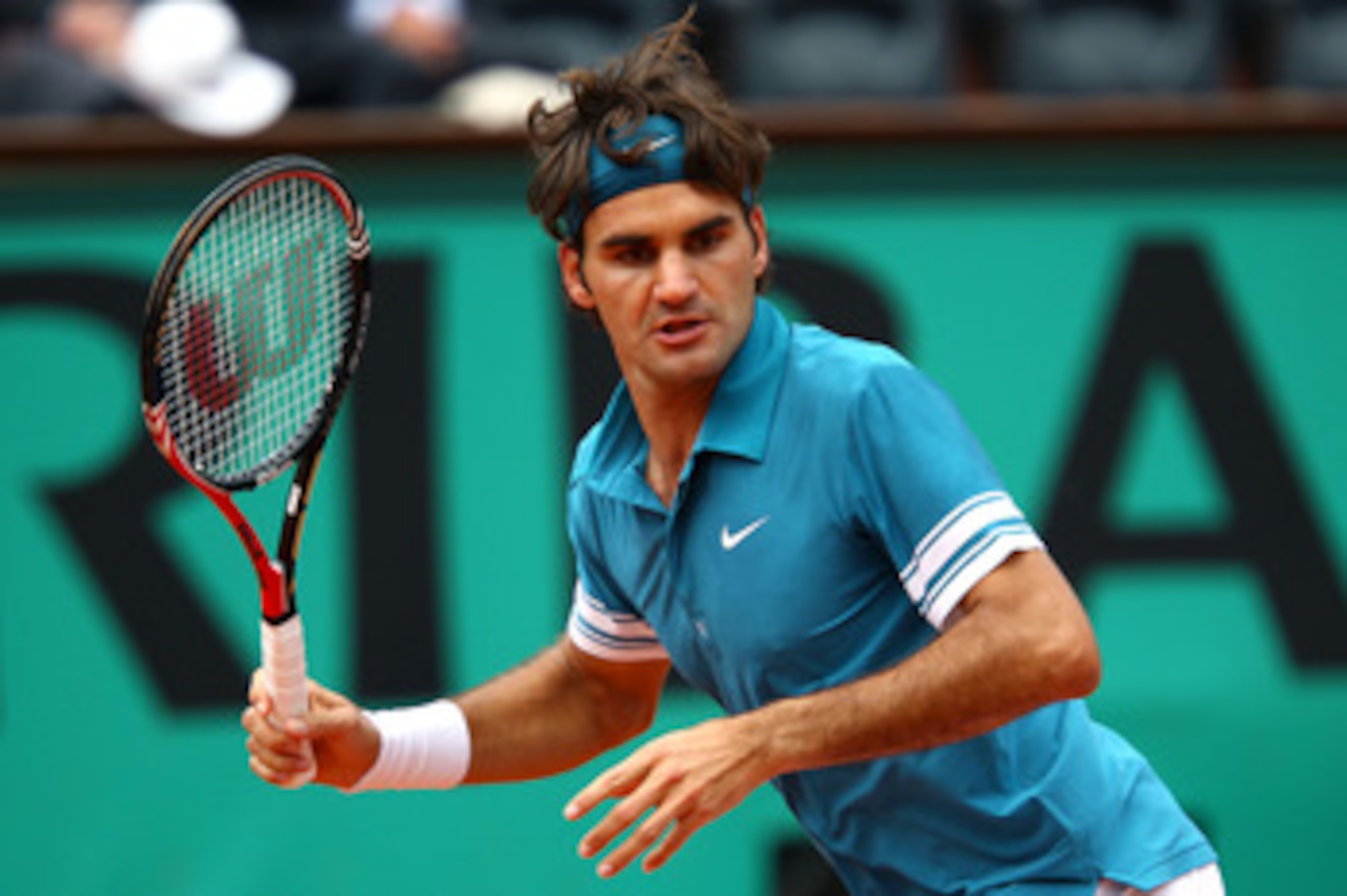 PARIS - MAY 26:  Roger Federer of Switzerland in action during the men's singles second round match between Roger Federer of Switzerland and Alejandro Falla of Colombia at the French Open on day four of the French Open at Roland Garros on May 26, 2010 in 