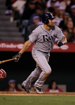 ANAHEIM, CA - JUNE 7:  Johnny Damon #22 of the Tampa Bay Rays hits an RBI double in the fourth inning against the Los Angeles Angels of Anaheim on June 7, 2011 at Angel Stadium in Anaheim, California.  (Photo by Stephen Dunn/Getty Images)