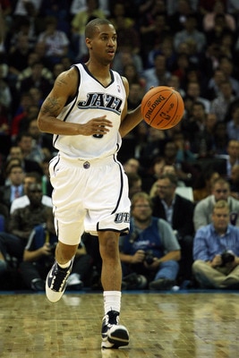 LONDON, ENGLAND - OCTOBER 06:  Eric Maynor of the Utah Jazz runs with the ball during the NBA pre-season game as part of the 2009 NBA Europe Live Tour between Chicago Bulls and Utah Jazz at the O2 Arena on October 6, 2009 in London, England.  NOTE TO USER