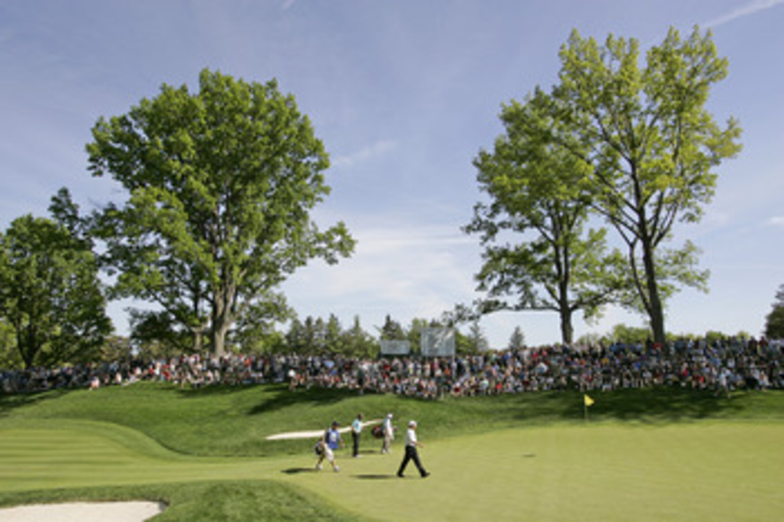 ROCHESTER NY - MAY 25: Bernhard Langer of Germany and Jeff Sluman walk onto the 13th green during the final round of the 69th Senior PGA Championship at Oak Hill Country Club - East Course on May 25 2008 in Rochester, New York. (Photo by Hunter Martin/Get