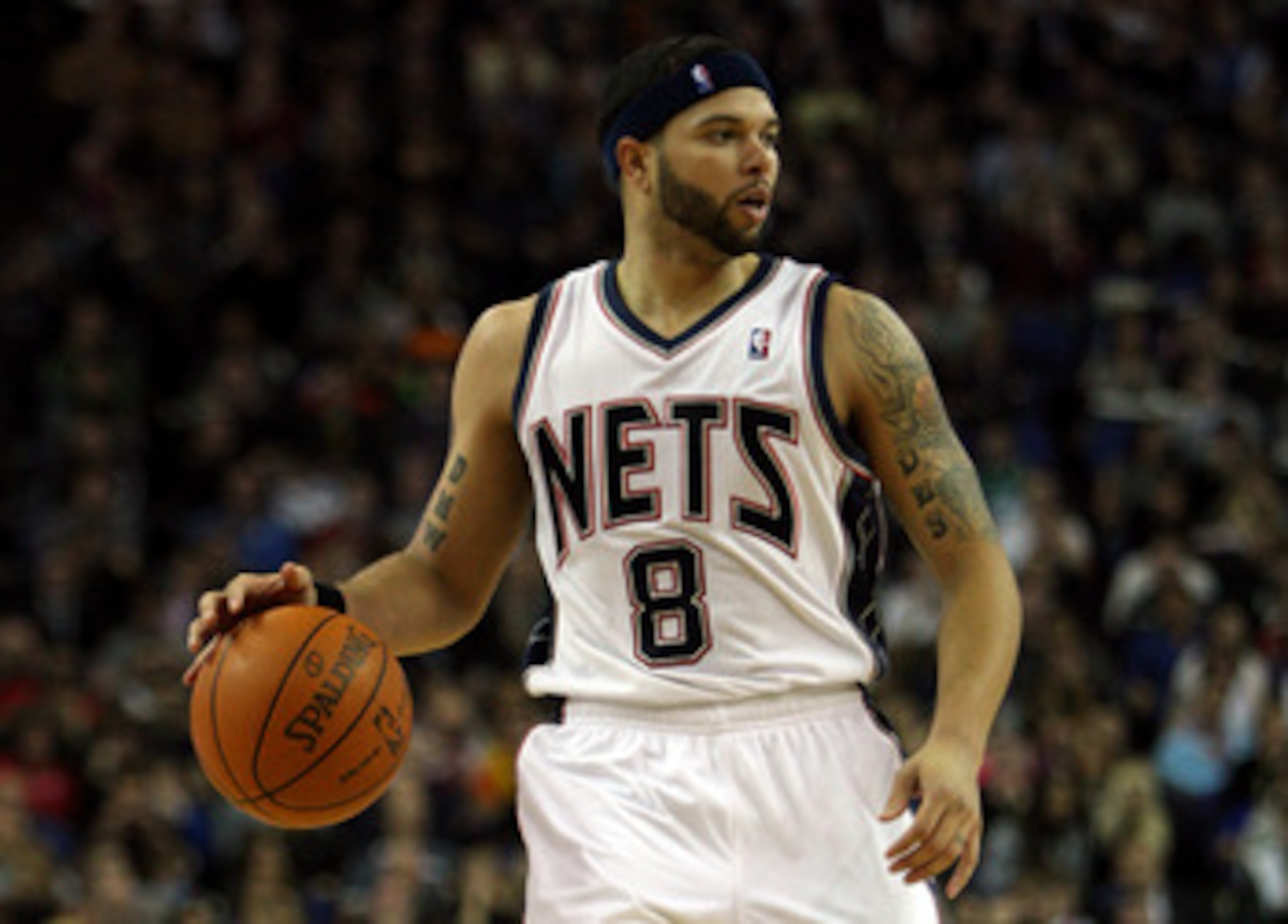 LONDON, ENGLAND - MARCH 04:  #8 Deron Williams of the Nets in action during the NBA match between New Jersey Nets and the Toronto Raptors at the O2 Arena on March 4, 2011 in London, England. NOTE TO USER: User expressly acknowledges and agrees that, by do