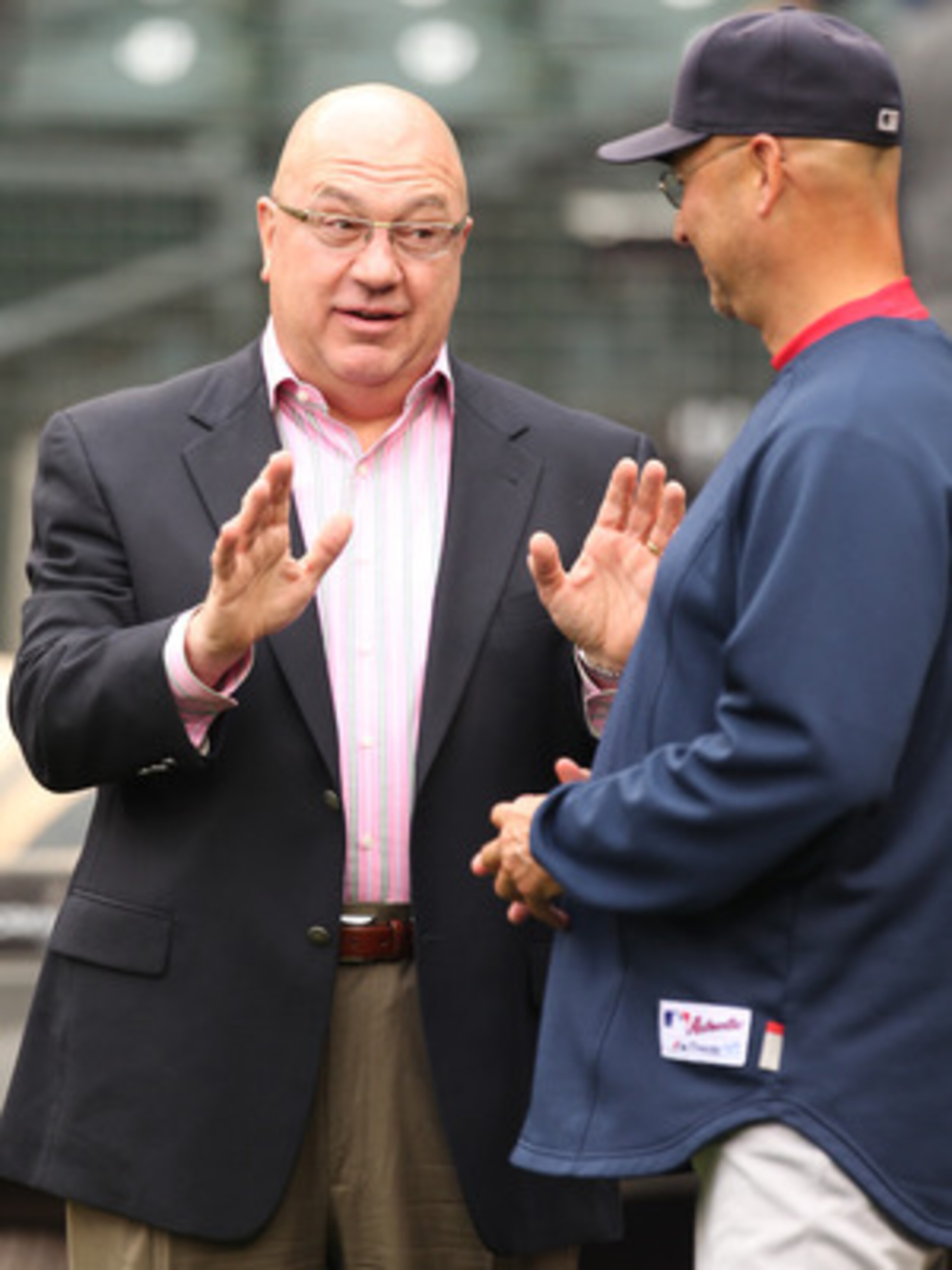 SEATTLE - SEPTEMBER 15:  Executive Vice President & GM  Jack Zduriencik (L) of the Seattle Mariners speaks with manager Terry Francona of the Boston Red Sox prior to the game at Safeco Field on September 15, 2010 in Seattle, Washington. (Photo by Otto Gre