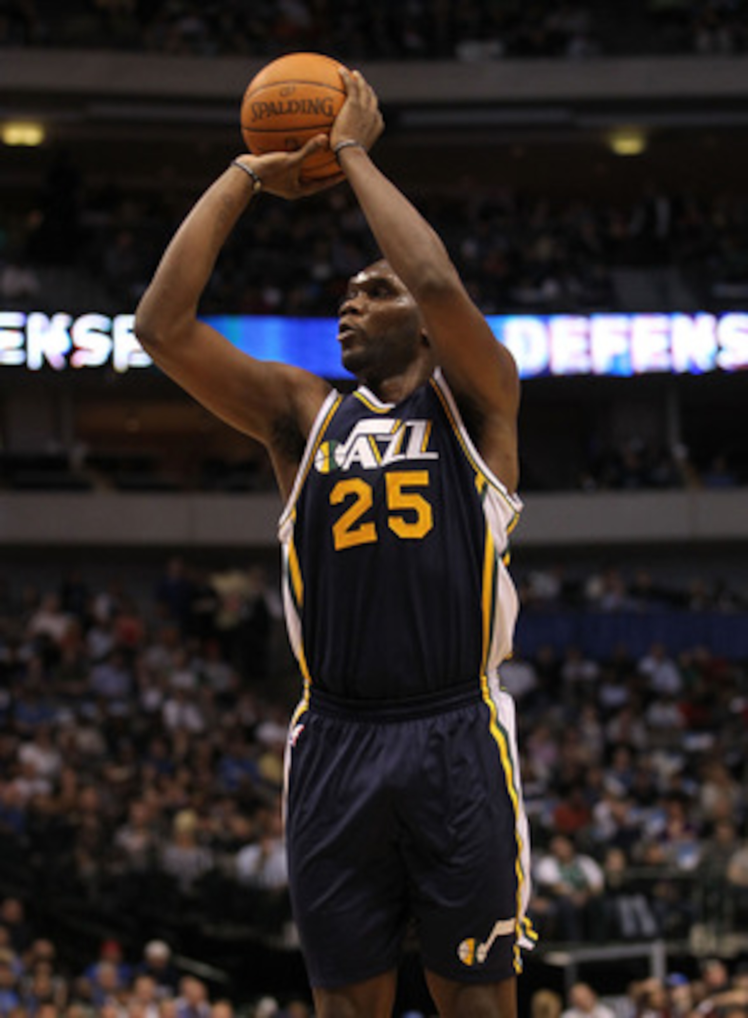 DALLAS, TX - FEBRUARY 23:  Forward Al Jefferson  #25 of the Utah Jazz takes a shot against the Dallas Mavericks at American Airlines Center on February 23, 2011 in Dallas, Texas.  NOTE TO USER: User expressly acknowledges and agrees that, by downloading a