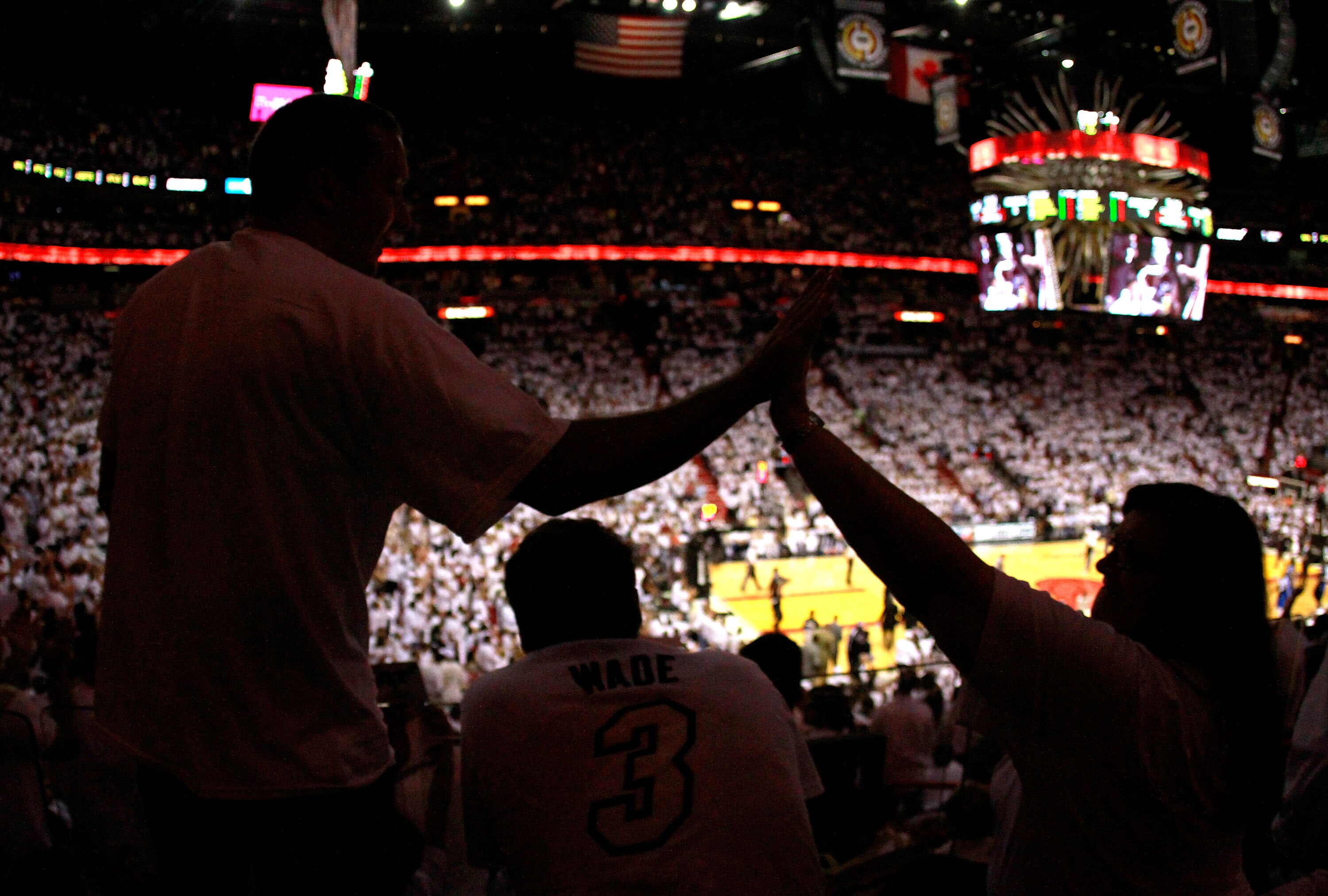 MIAMI, FL - MAY 31: Fans of the Miami Heat react in the first half as the Heat take on the Dallas Mavericks in Game One of the 2011 NBA Finals at American Airlines Arena on May 31, 2011 in Miami, Florida. NOTE TO USER: User expressly acknowledges and agr MIAMI, FL - MAY 31: Fans of the Miami Heat react in the first half as the Heat take on the Dallas Mavericks in Game One of the 2011 NBA Finals at American Airlines Arena on May 31, 2011 in Miami, Florida. NOTE TO USER: User expressly acknowledges and agr