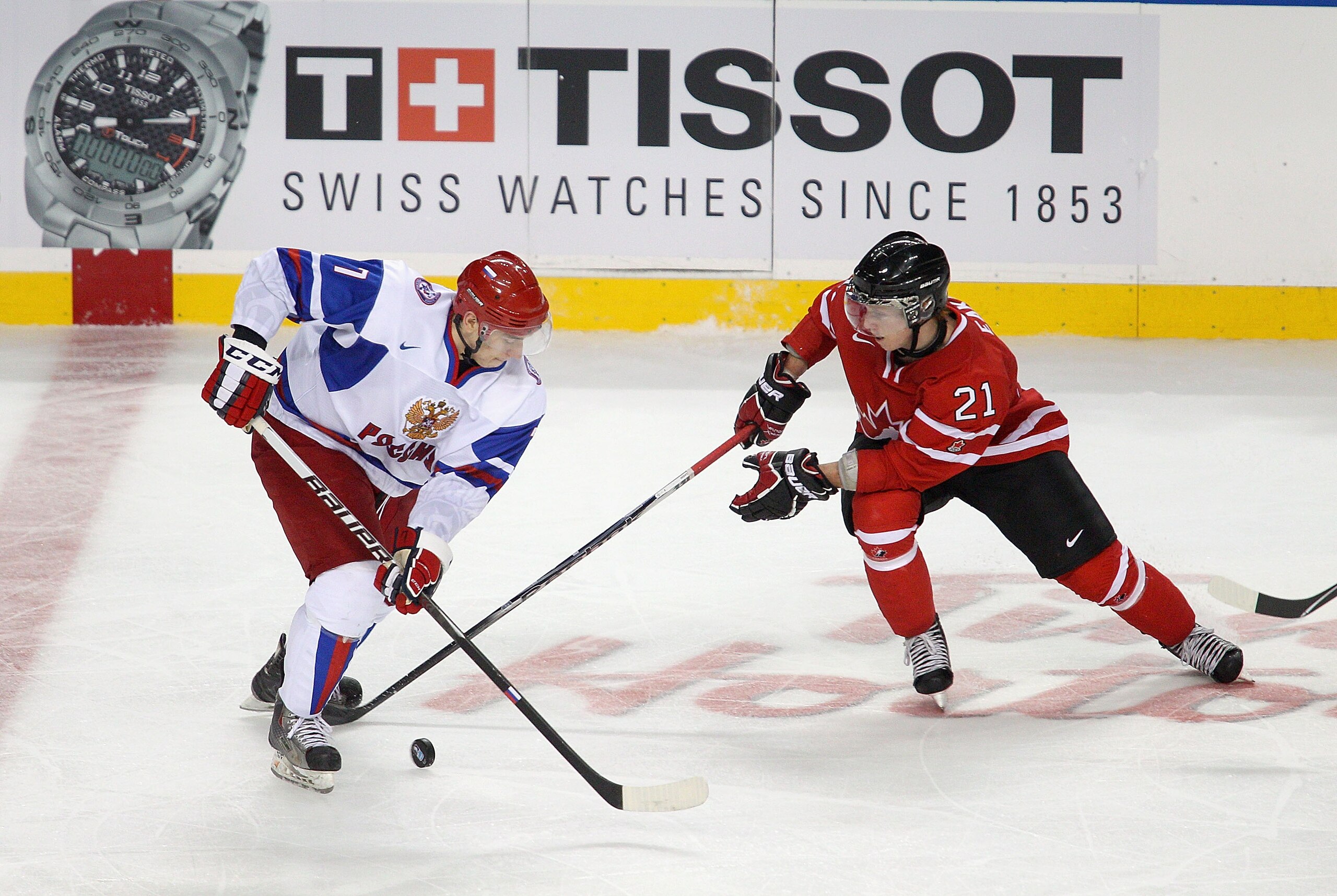 BUFFALO, NY - JANUARY 05: Anton Burdasov #7 of Russia skates against Cody Eakin #21 of Canada during the 2011 IIHF World U20 Championship Gold medal game between Canada and Russia at the HSBC Arena on January 5, 2011 in Buffalo, New York.  (Photo by Rick