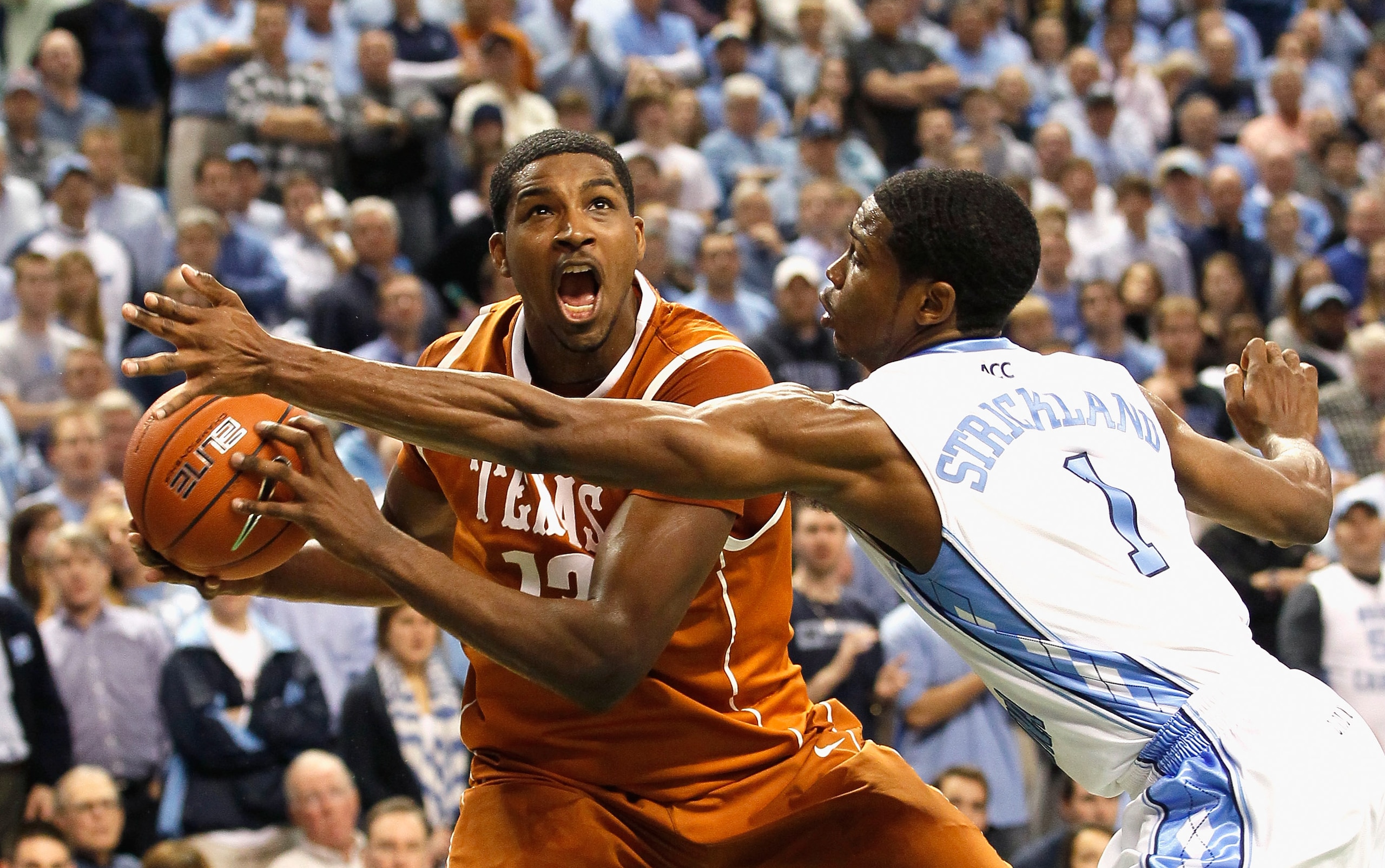 GREENSBORO, NC - DECEMBER 18:  Tristan Thompson #13 of the Texas Longhorns against Dexter Strickland #1 of the North Carolina Tar Heels at Greensboro Coliseum on December 18, 2010 in Greensboro, North Carolina.  (Photo by Kevin C. Cox/Getty Images)