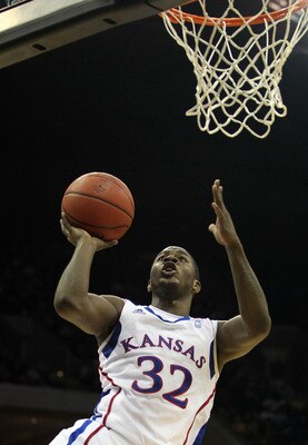 TULSA, OK - MARCH 18:  Josh Selby #32 of the Kansas Jayhawks goes up for a shot against the Boston University Terriers during the second round of the 2011 NCAA men's basketball tournament at BOK Center on March 18, 2011 in Tulsa, Oklahoma.  (Photo by Rona