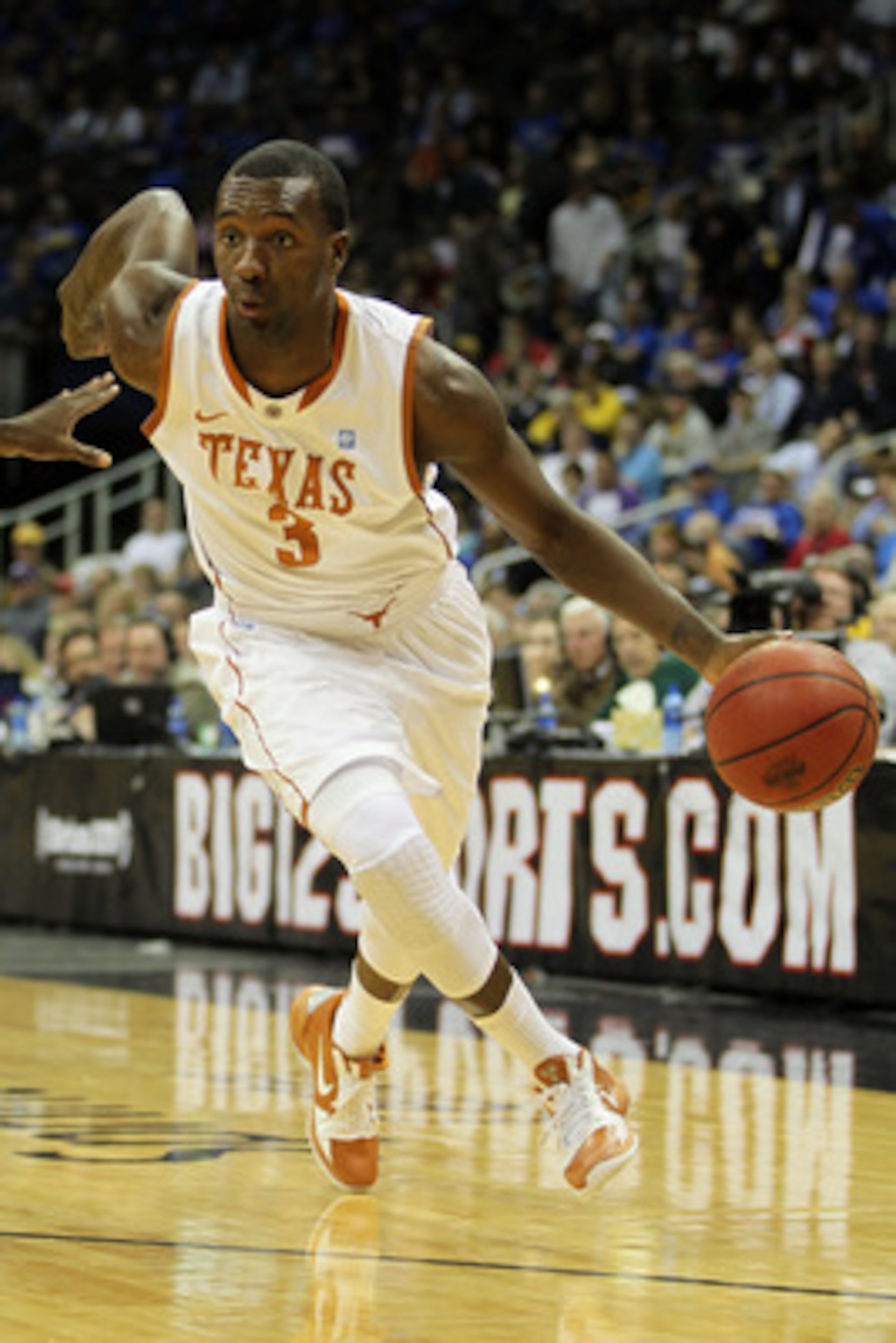KANSAS CITY, MO - MARCH 11: Jordan Hamilton #3 of the Texas Longhorns drives with the ball against the Texas A&M Aggies during their semifinal game in the 2011 Phillips 66 Big 12 Men's Basketball Tournament at Sprint Center on March 11, 2011 in Kansas Ci KANSAS CITY, MO - MARCH 11: Jordan Hamilton #3 of the Texas Longhorns drives with the ball against the Texas A&M Aggies during their semifinal game in the 2011 Phillips 66 Big 12 Men's Basketball Tournament at Sprint Center on March 11, 2011 in Kansas Ci