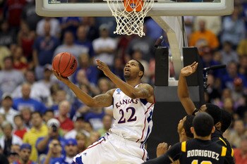 SAN ANTONIO, TX - MARCH 27:  Marcus Morris #22 of the Kansas Jayhawks goes to the basket against the Virginia Commonwealth Rams during the southwest regional final of the 2011 NCAA men's basketball tournament at the Alamodome on March 27, 2011 in San Anto