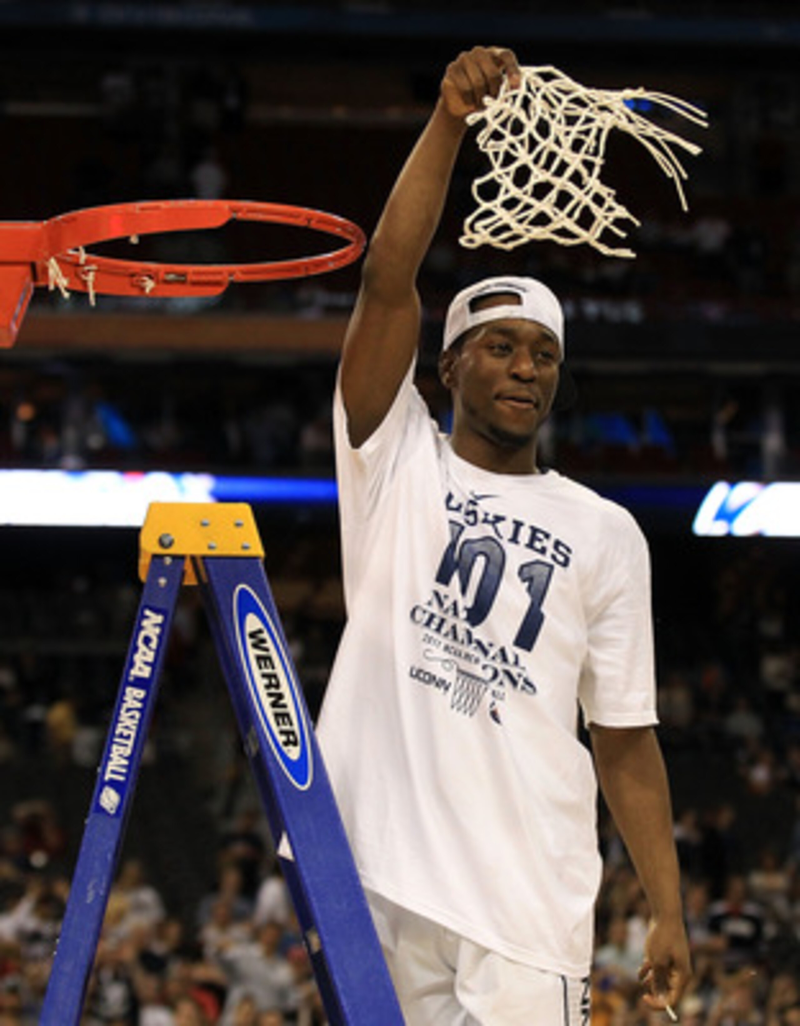 HOUSTON, TX - APRIL 04: Kemba Walker #15 of the Connecticut Huskies cuts down the net after defeating the Butler Bulldogs to win the National Championship Game of the 2011 NCAA Division I Men's Basketball Tournament by a score of 53-41 at Reliant Stadium HOUSTON, TX - APRIL 04: Kemba Walker #15 of the Connecticut Huskies cuts down the net after defeating the Butler Bulldogs to win the National Championship Game of the 2011 NCAA Division I Men's Basketball Tournament by a score of 53-41 at Reliant Stadium