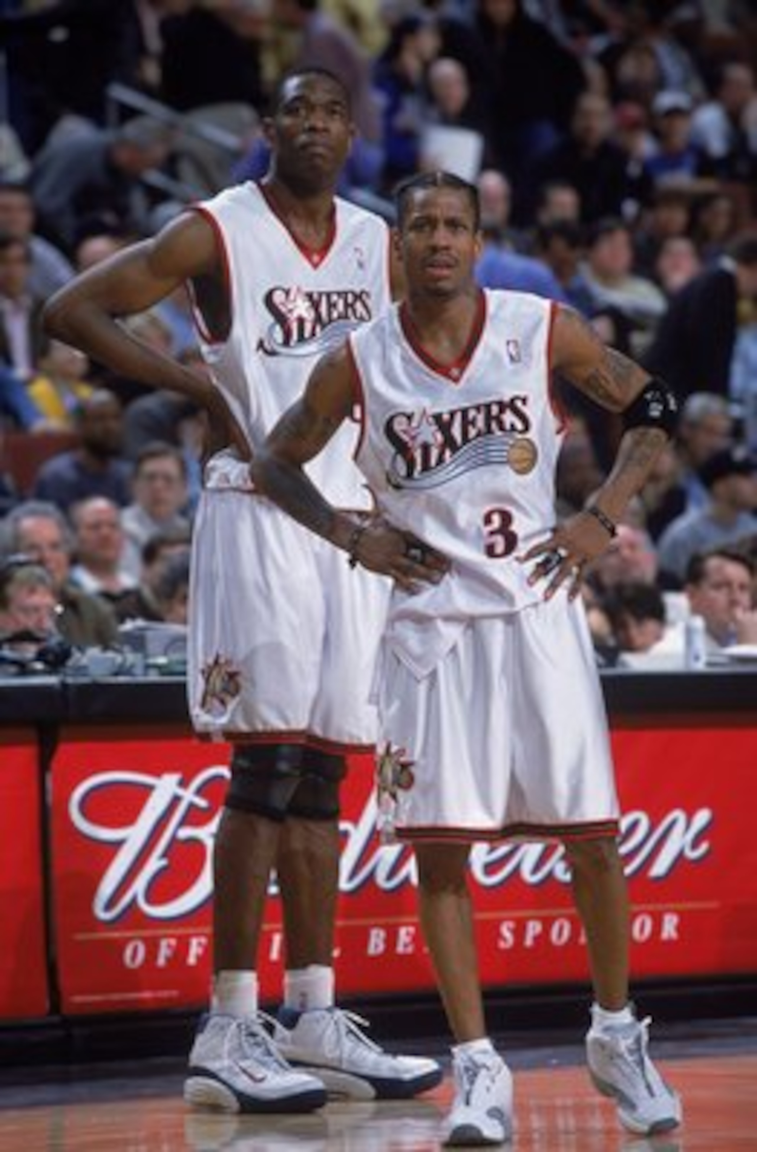 27 Feb 2001:  Allen Iverson #3 and Dikembe Mutombo #55 of the Philadelphia 76ers looks on from the court during the game against the Milwaukee Bucks at the First Union Center in Philadelphia, Pennsylvania.  The Bucks defeated the 76ers 98-91.    NOTE TO U