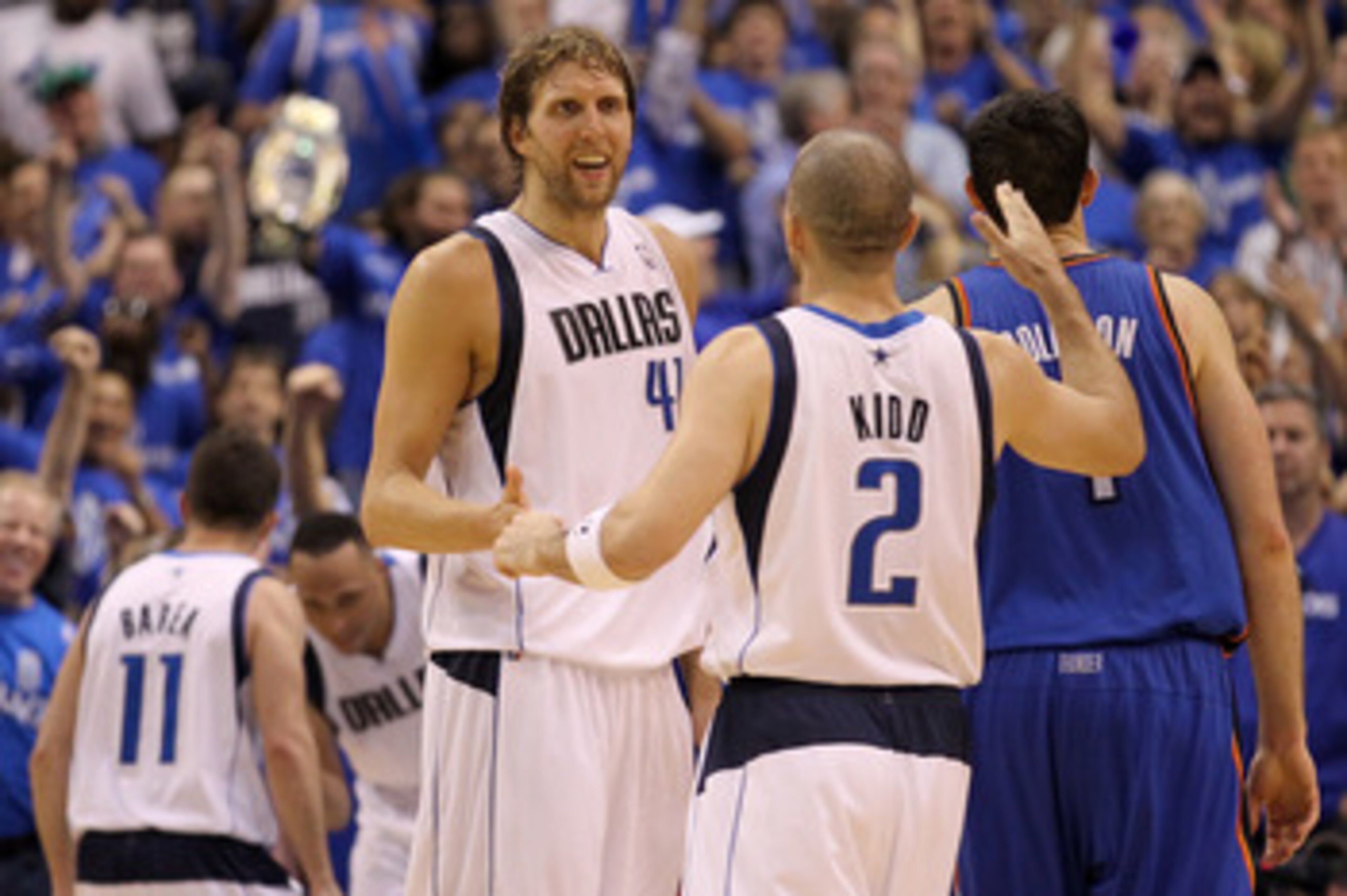 DALLAS, TX - MAY 25:  Dirk Nowitzki #41 and Jason Kidd #2 of the Dallas Mavericks celebrate late in the fourth quarter while taking on the Oklahoma City Thunder in Game Five of the Western Conference Finals during the 2011 NBA Playoffs at American Airline