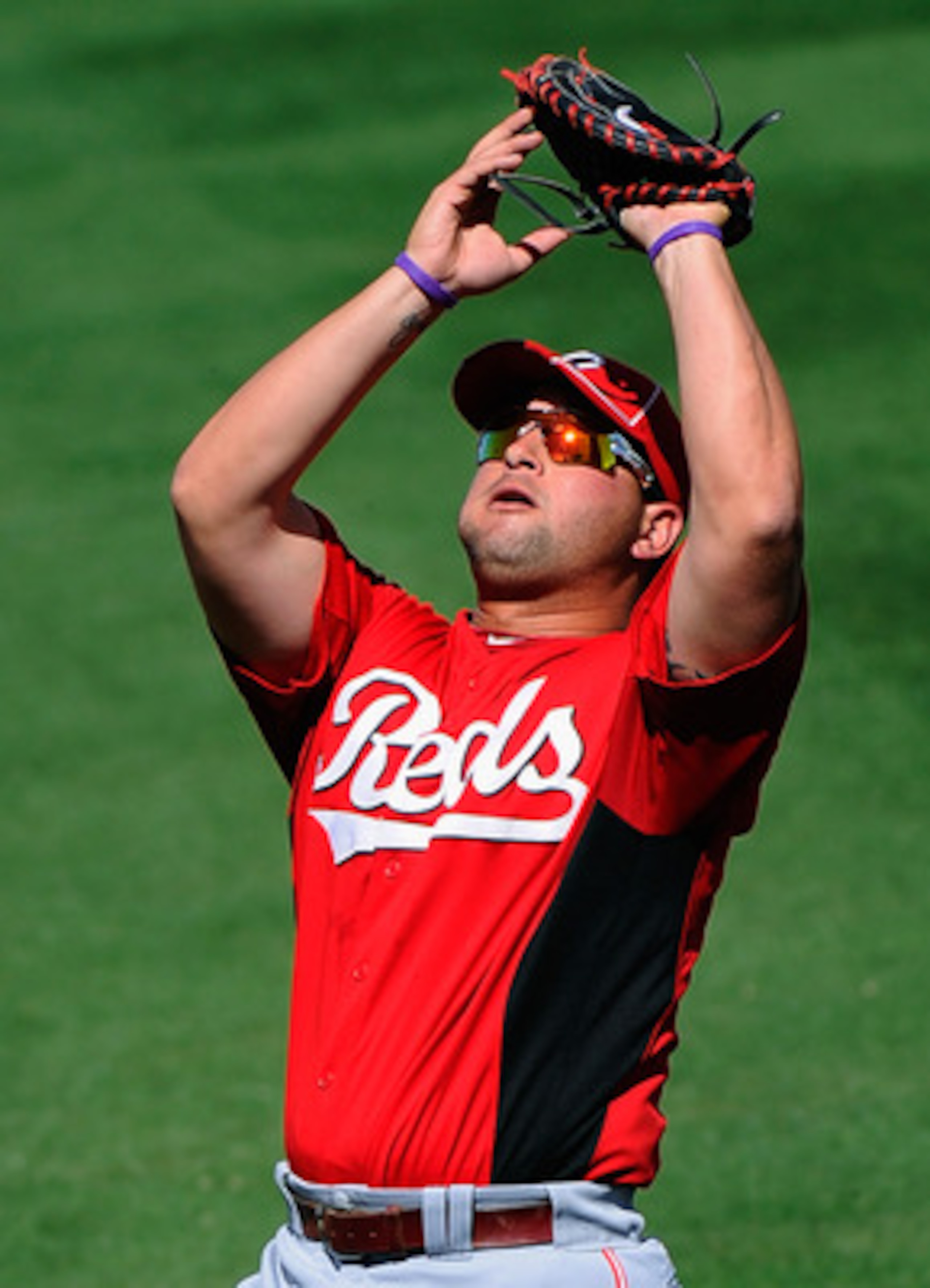 SCOTTSDALE, AZ - MARCH 14:  Yonder Alonso #23 of the Cincinnati Reds against the Colorodo Rockies during the spring training baseball game at Salt River Fields at Talking Stick on March 14, 2011 in Scottsdale, Arizona.  (Photo by Kevork Djansezian/Getty I
