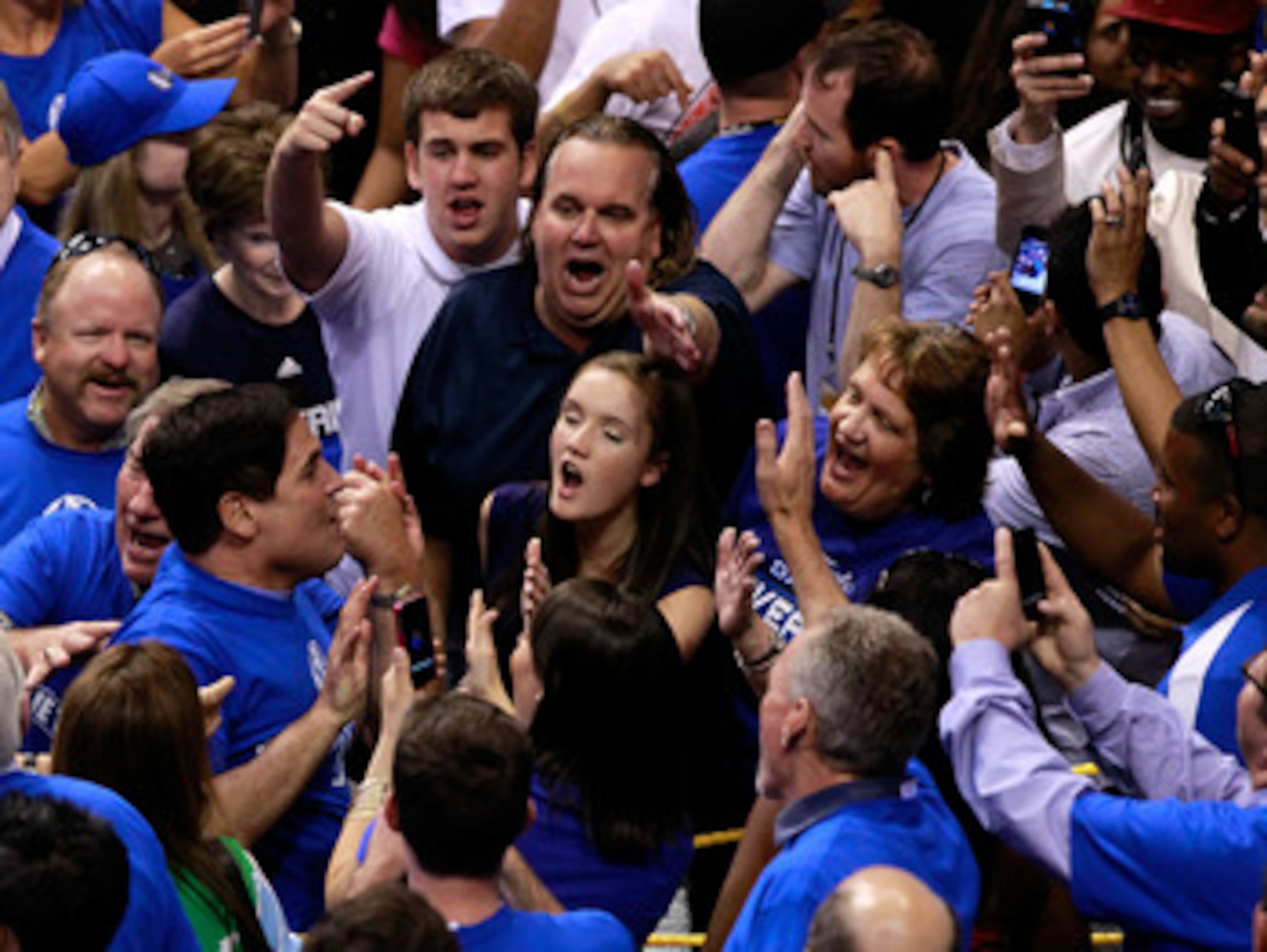DALLAS, TX - JUNE 09:  Team owner Mark Cuban of the Dallas Mavericks celebrates with fans after the Mavericks won 112-103 against the Miami Heat in Game Five of the 2011 NBA Finals at American Airlines Center on June 9, 2011 in Dallas, Texas.  NOTE TO USE