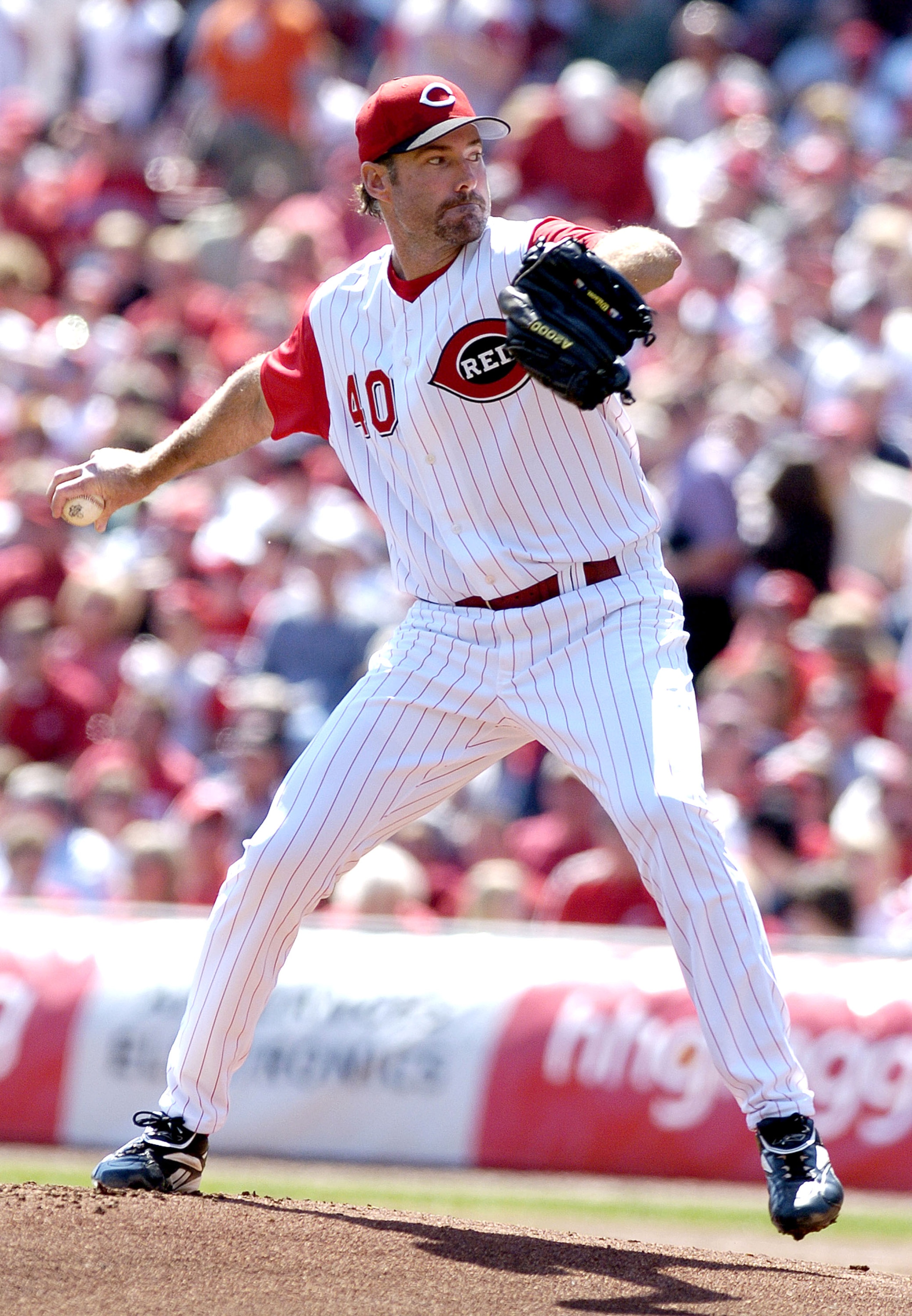 CINCINNATI, OH - APRIL 4:  Paul Wilson #40 of the Cincinnati Reds winds up for a pitch on April 4, 2005 at Great American Ballpark in Cincinnati, Ohio. The Reds defeated the Mets 7-6.  (Photo by David Maxwell/Getty Images)