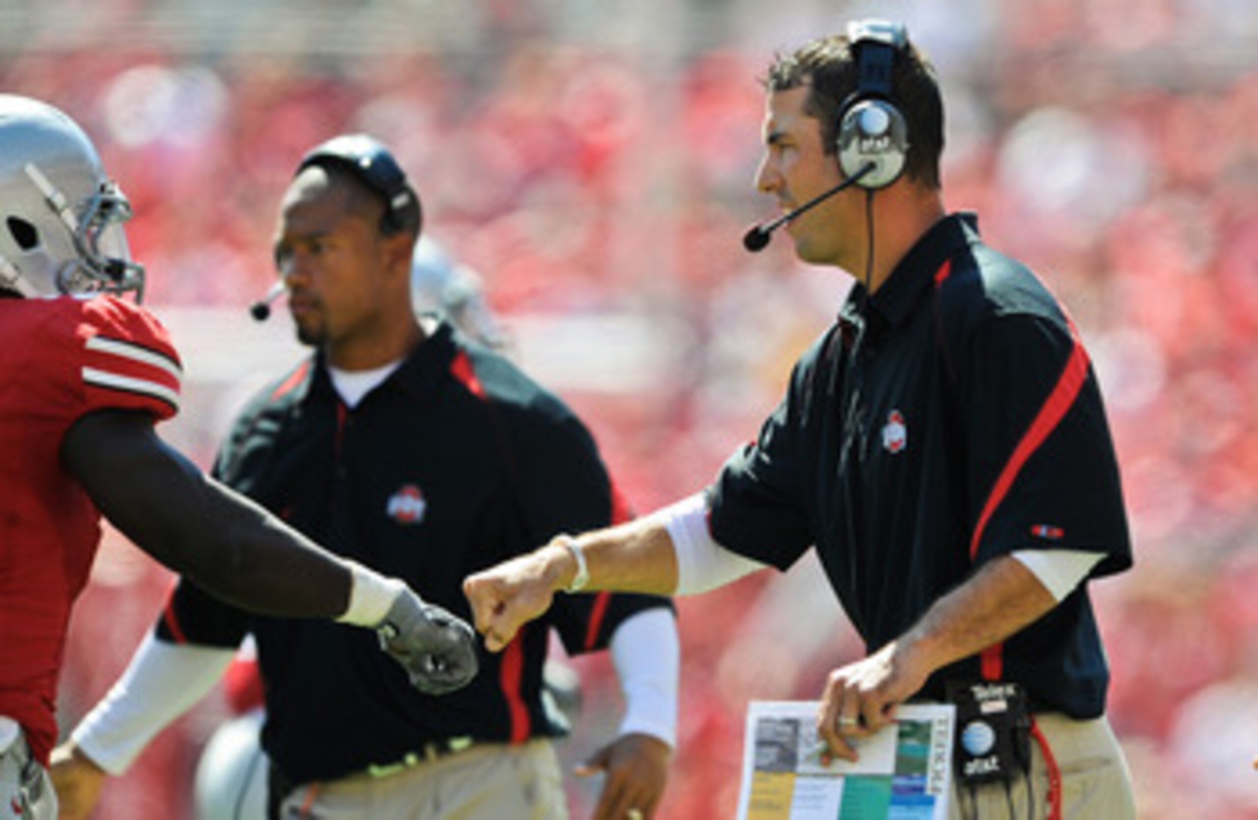 COLUMBUS, OH - SEPTEMBER 18:  Assistant Coach Luke Fickell of the Ohio State Buckeyes fists pump one of his players during a game against the Ohio Bobcats at Ohio Stadium on September 18, 2010 in Columbus, Ohio.  (Photo by Jamie Sabau/Getty Images)