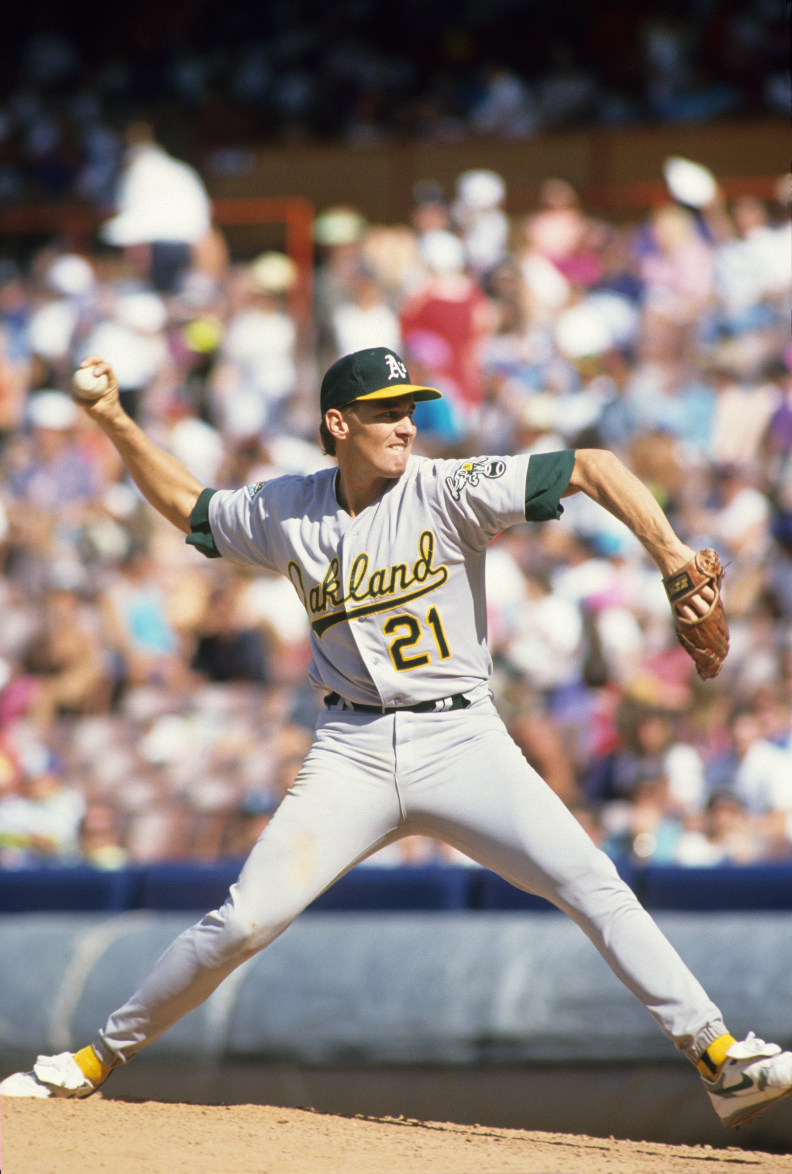 ANAHEIM, CA - JUNE 21:  Mike Moore #21 of the Oakland Athletics pitches during the game against the California Angels at Anaheim Stadium on June 21, 1992 in Anaheim, California. (Photo by Jed Jacobsohn/Getty Images)