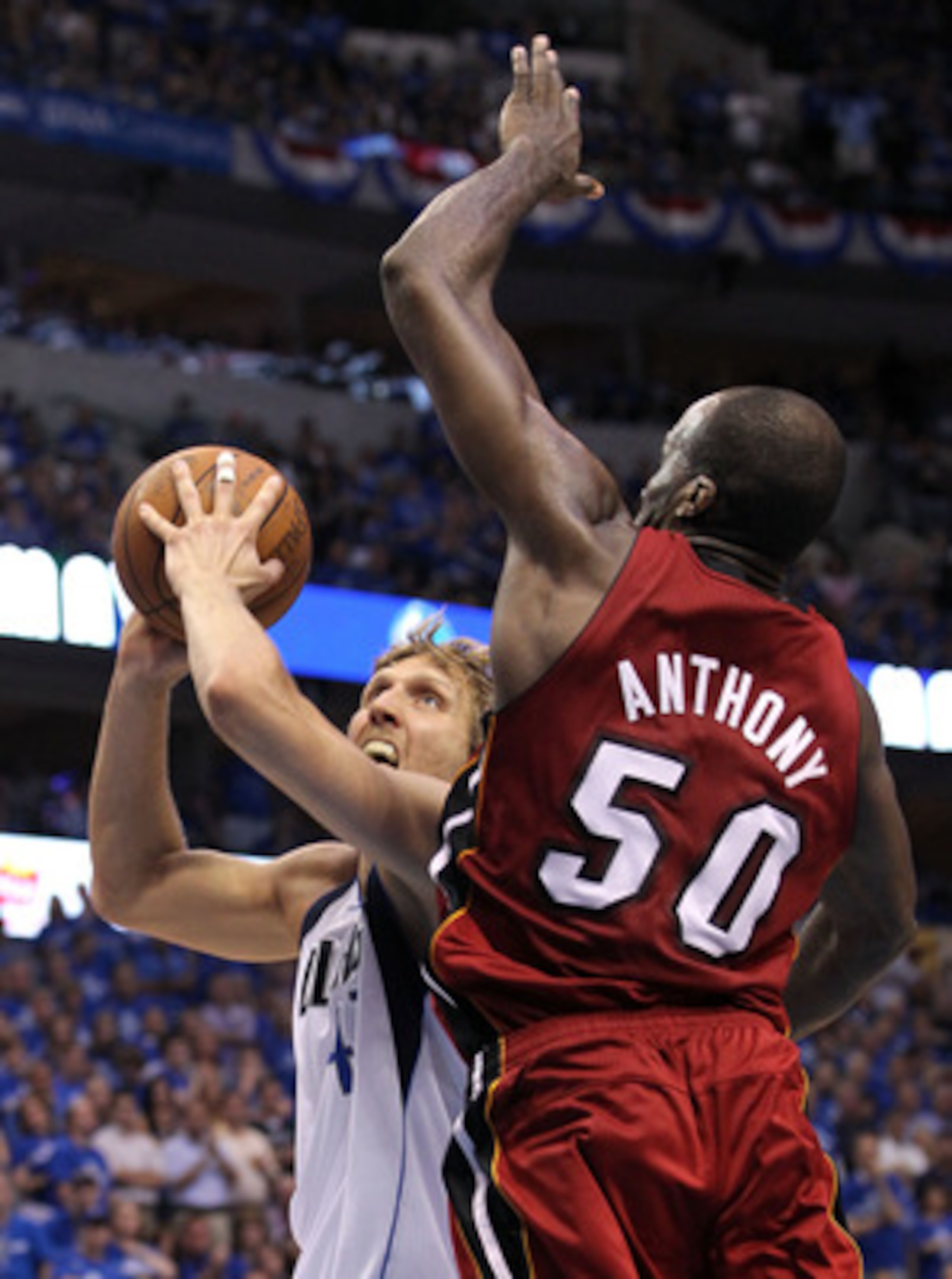 DALLAS, TX - JUNE 07:  Dirk Nowitzki #41 of the Dallas Mavericks drives against Joel Anthony #50 of the Miami Heat in Game Four of the 2011 NBA Finals at American Airlines Center on June 7, 2011 in Dallas, Texas. NOTE TO USER: User expressly acknowledges