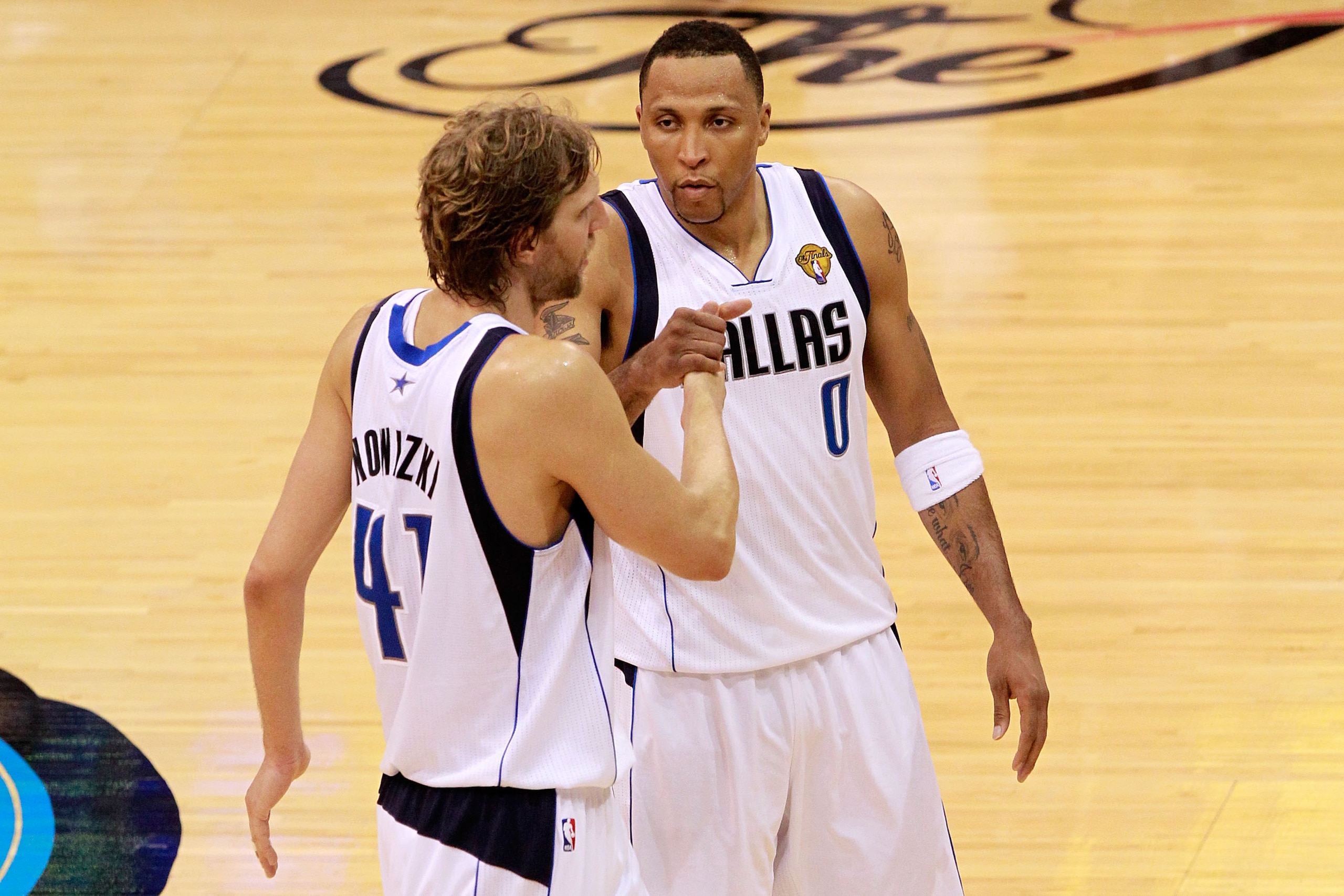 DALLAS, TX - JUNE 09:  (L-R) Dirk Nowitzki #41 and Shawn Marion #0 of the Dallas Mavericks celebrate their 112-103 win against the Miami Heat in Game Five of the 2011 NBA Finals at American Airlines Center on June 9, 2011 in Dallas, Texas.  NOTE TO USER: