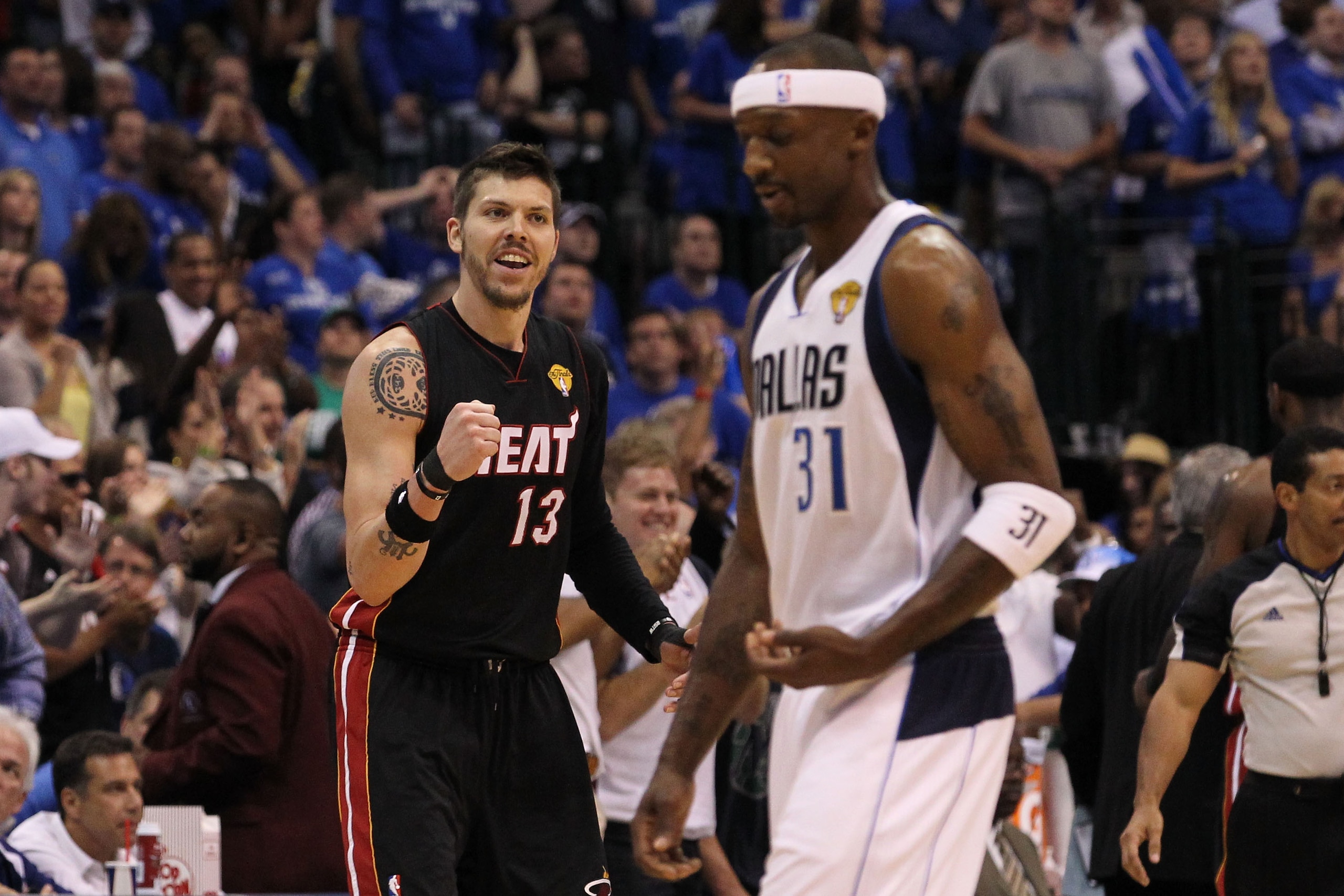 DALLAS, TX - JUNE 09:  Mike Miller #13 of the Miami Heat reacts against Jason Terry #31 of the Dallas Mavericks  in Game Five of the 2011 NBA Finals at American Airlines Center on June 9, 2011 in Dallas, Texas.  NOTE TO USER: User expressly acknowledges a