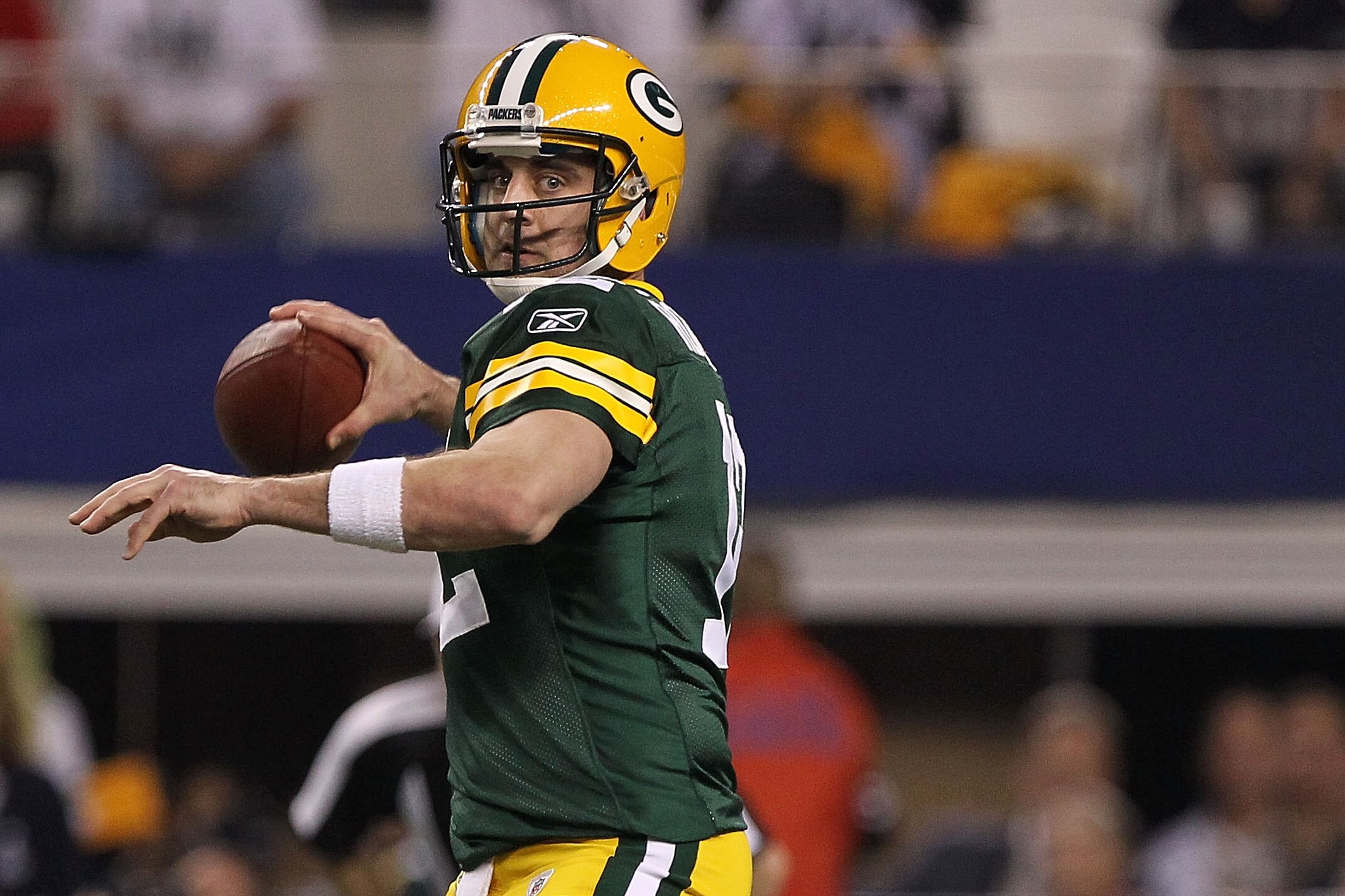 ARLINGTON, TX - FEBRUARY 06:  Quarterback Aaron Rodgers #12 of the Green Bay Packers throws the ball against the Pittsburgh Steelers during Super Bowl XLV at Cowboys Stadium on February 6, 2011 in Arlington, Texas.  (Photo by Doug Pensinger/Getty Images)