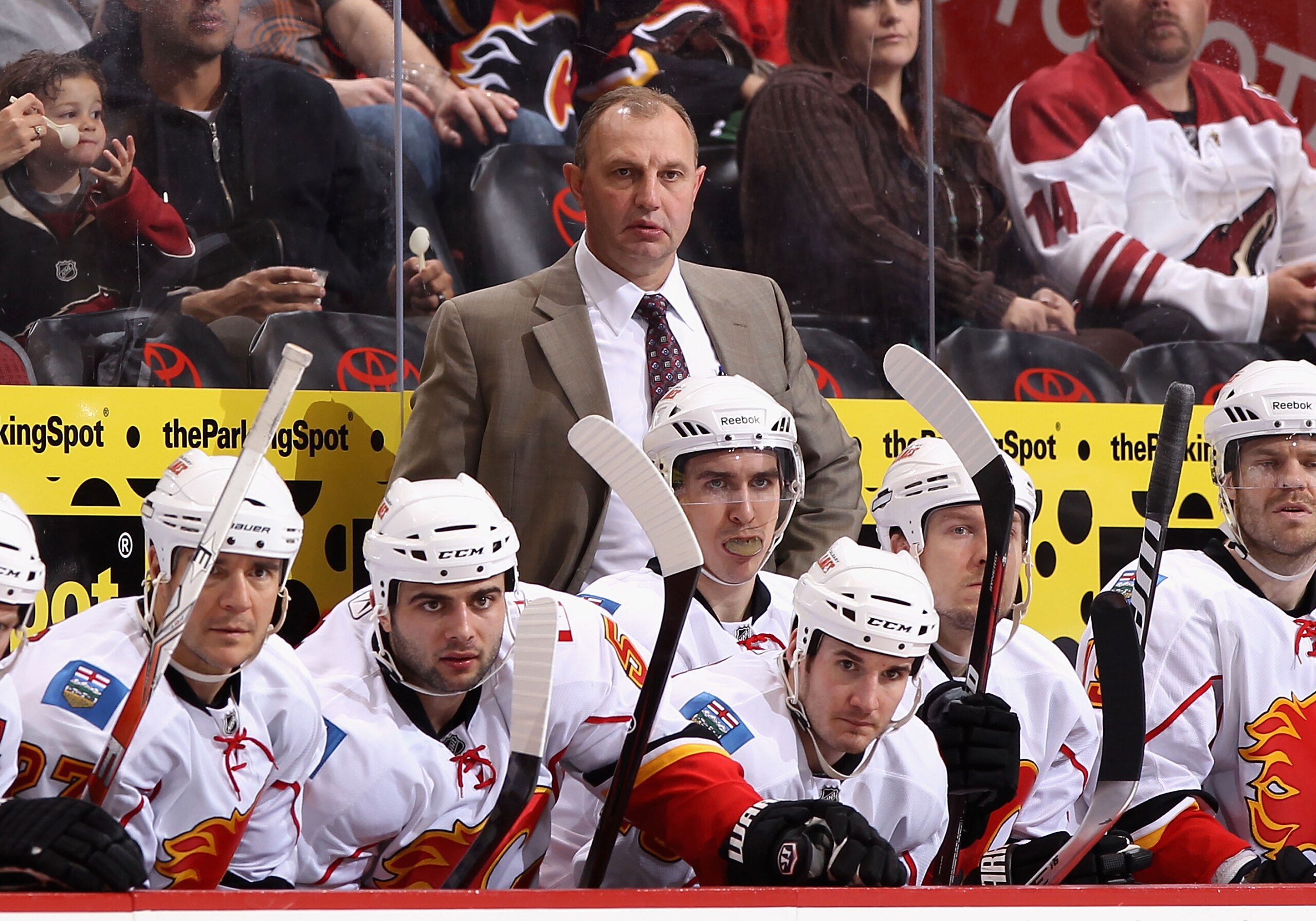 GLENDALE, AZ - MARCH 10:  Head coach Brent Sutter of the Calgary Flames watches from the bench during the NHL game against the Phoenix Coyotes at Jobing.com Arena on March 10, 2011 in Glendale, Arizona.  The Coyotes defeated the Flames 3-0.  (Photo by Chr