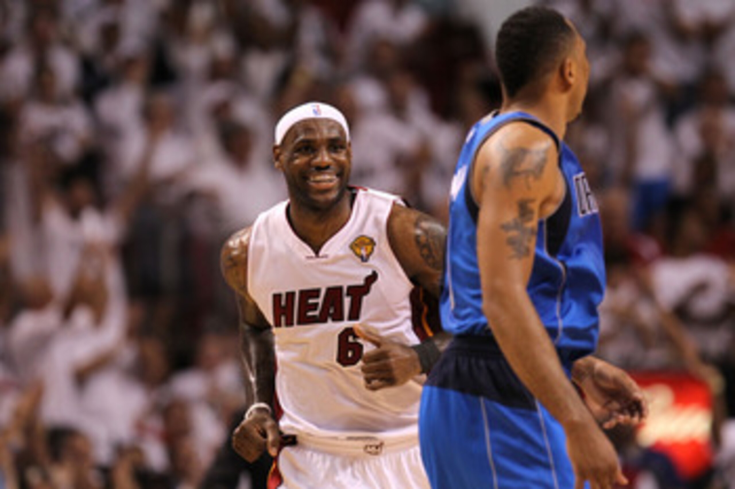 MIAMI, FL - JUNE 02:  LeBron James #6 of the Miami Heat reacts as he runs by Shawn Marion #0 of the Dallas Mavericks in the first half of Game Two of the 2011 NBA Finals at American Airlines Arena on June 2, 2011 in Miami, Florida. NOTE TO USER: User expr
