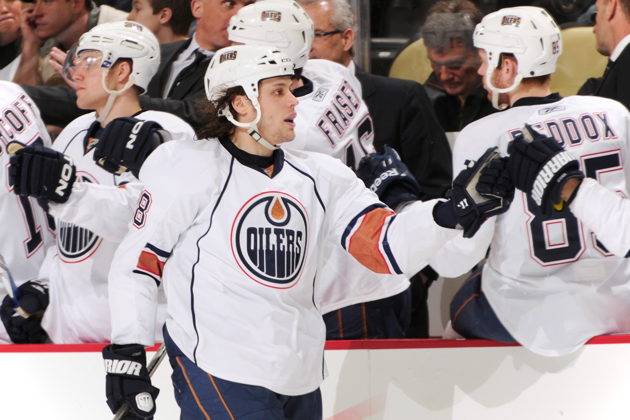 PITTSBURGH, PA - MARCH 13:  Ryan Jones #28 of the Edmonton Oilers is congratulated by teammates after scoring a goal against the Pittsburgh Penguins on March 13, 2011 at CONSOL Energy Center in Pittsburgh, Pennsylvania.  (Photo by Jamie Sabau/Getty Images