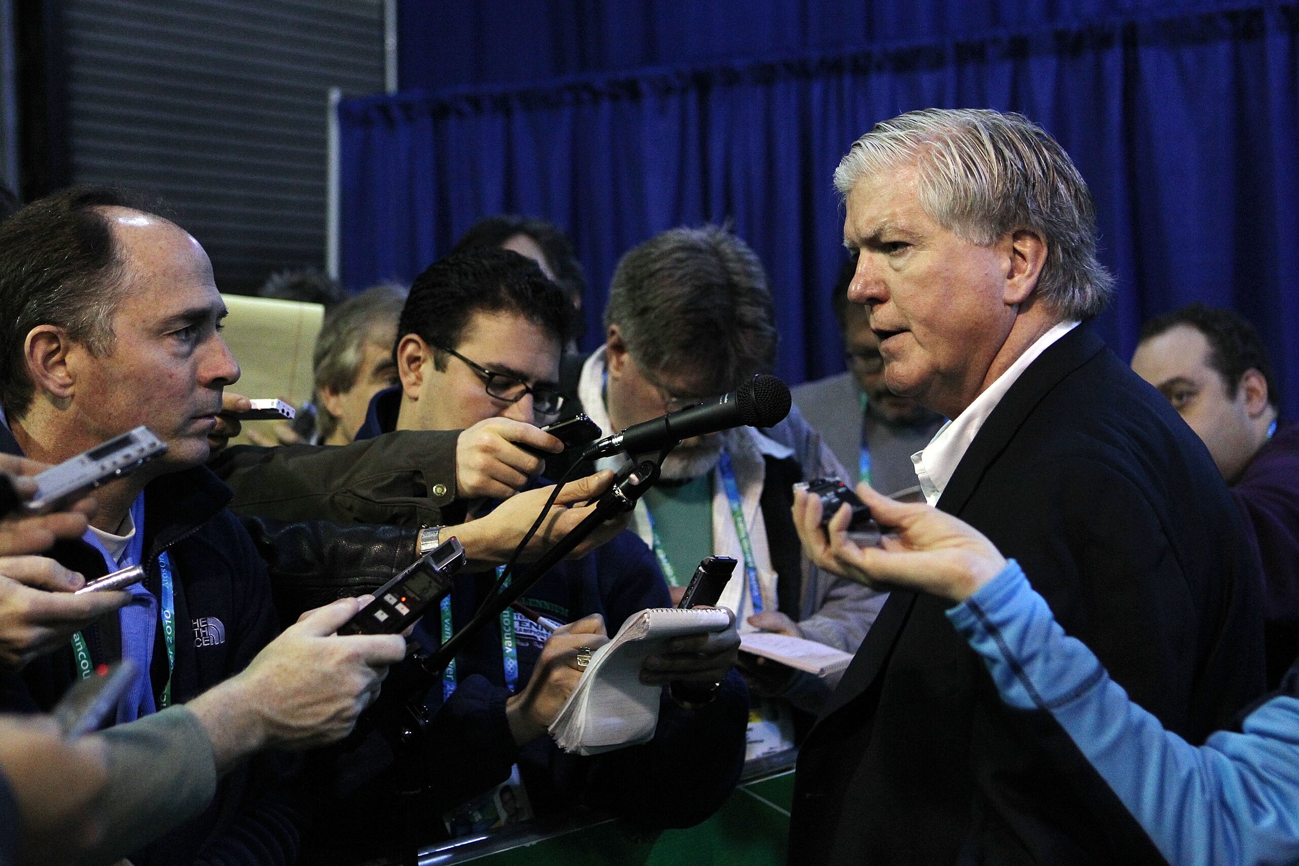 VANCOUVER, BC - FEBRUARY 22:  Hockey USA General Manager and Toronto Maple Leafs GM Brian Burke (R) speaks to the media prior to the start of the Women's USA vs. Sweden  women's semifinal game on day 11 of the Vancouver 2010 Winter Olympics at Canada Hock