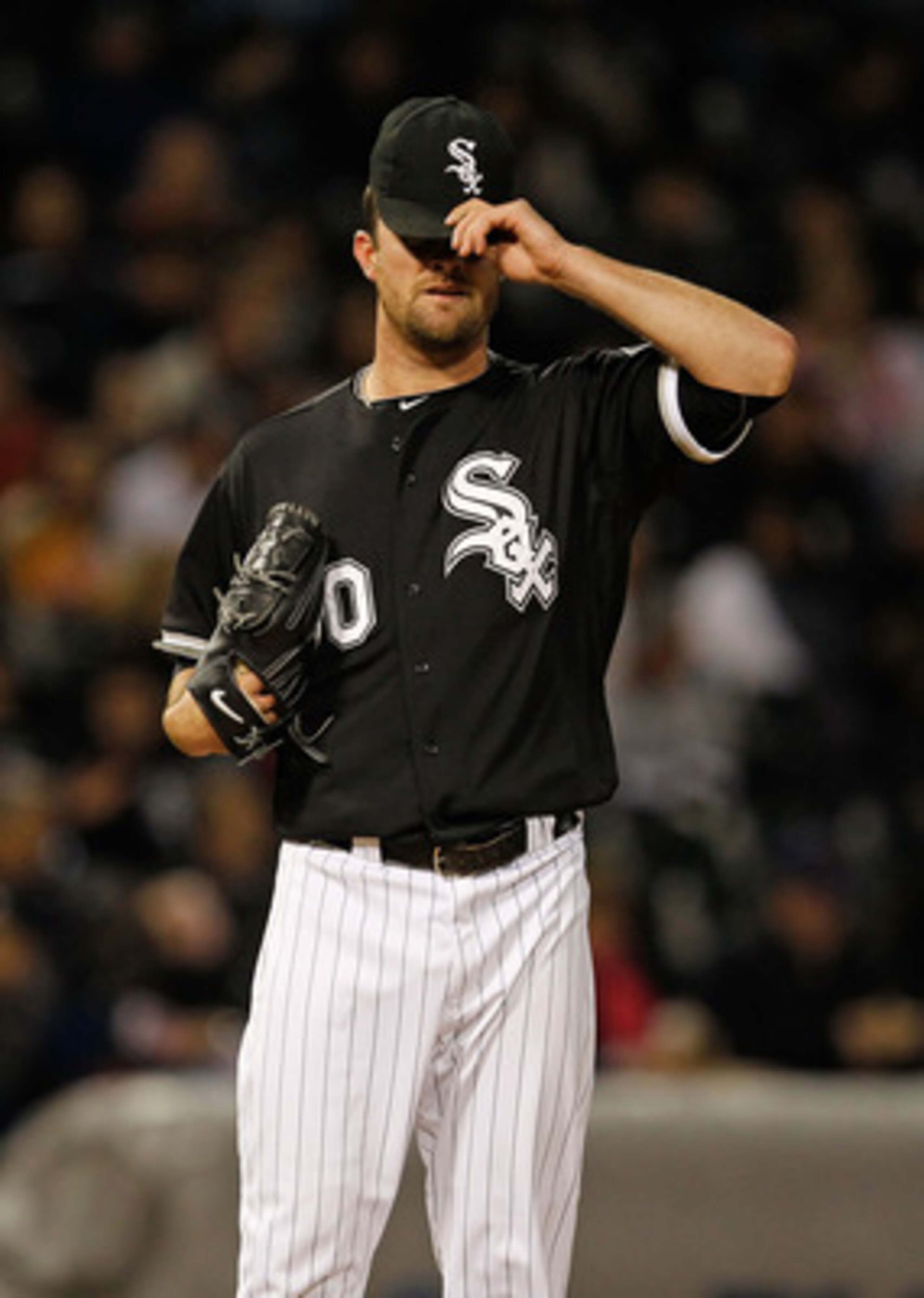 CHICAGO - MAY 06: Starting pitcher John Danks #50 of the Chicago White Sox reacts after the Toronto Blue Jays score two runs in the 5th inning at U.S. Cellular Field on May 6, 2010 in Chicago, Illinois. The Blue Jays defeated the White Sox 2-0. (Photo by 
