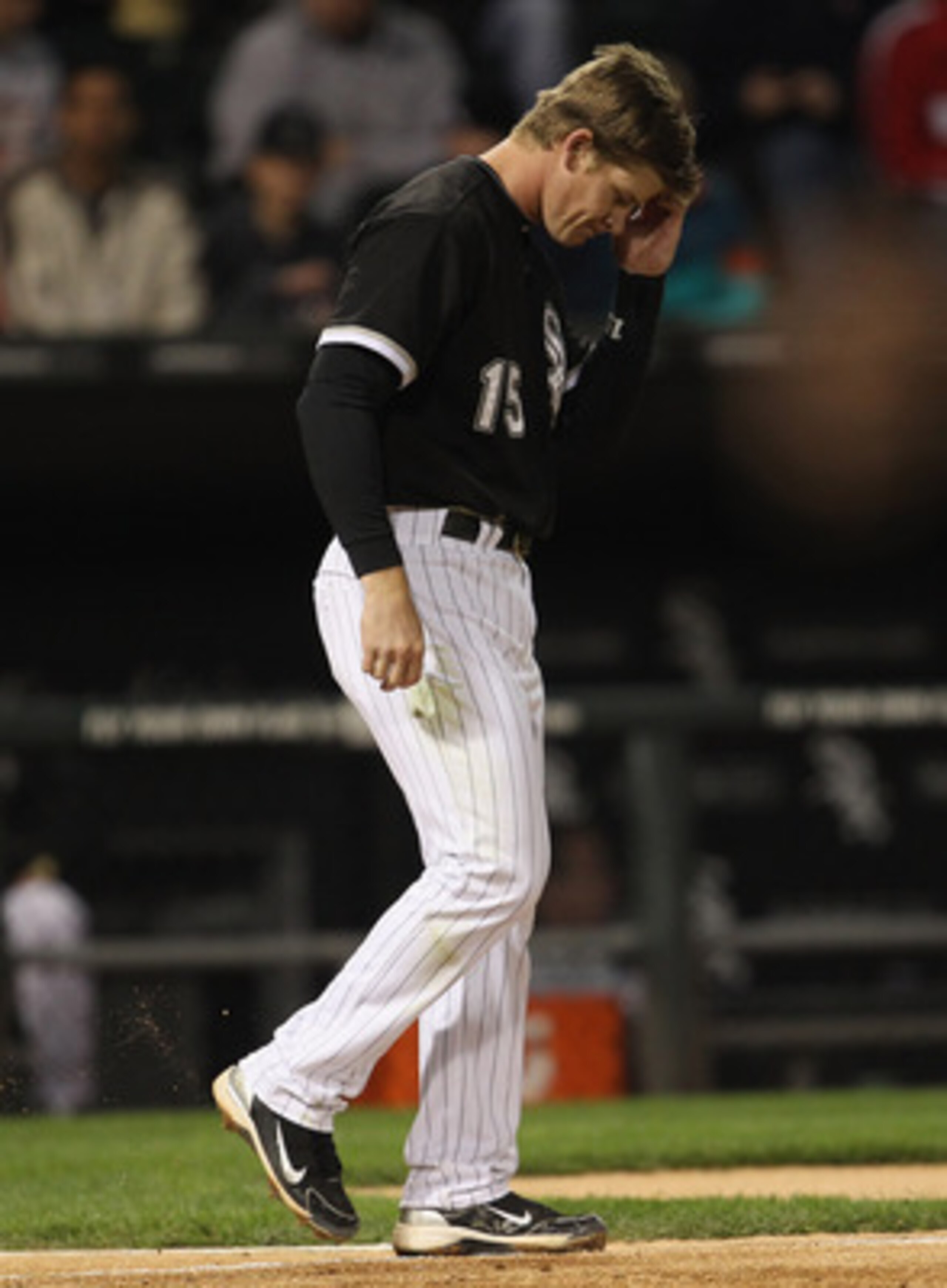 CHICAGO, IL - MAY 16: Gordon Beckham #15 of the Chicago White Sox reacts after striking out to end an inning against the Texas Rangers at U.S. Cellular Field on May 16, 2011 in Chicago, Illinois. The Rangers defeated the White Sox 4-0. (Photo by Jonathan 