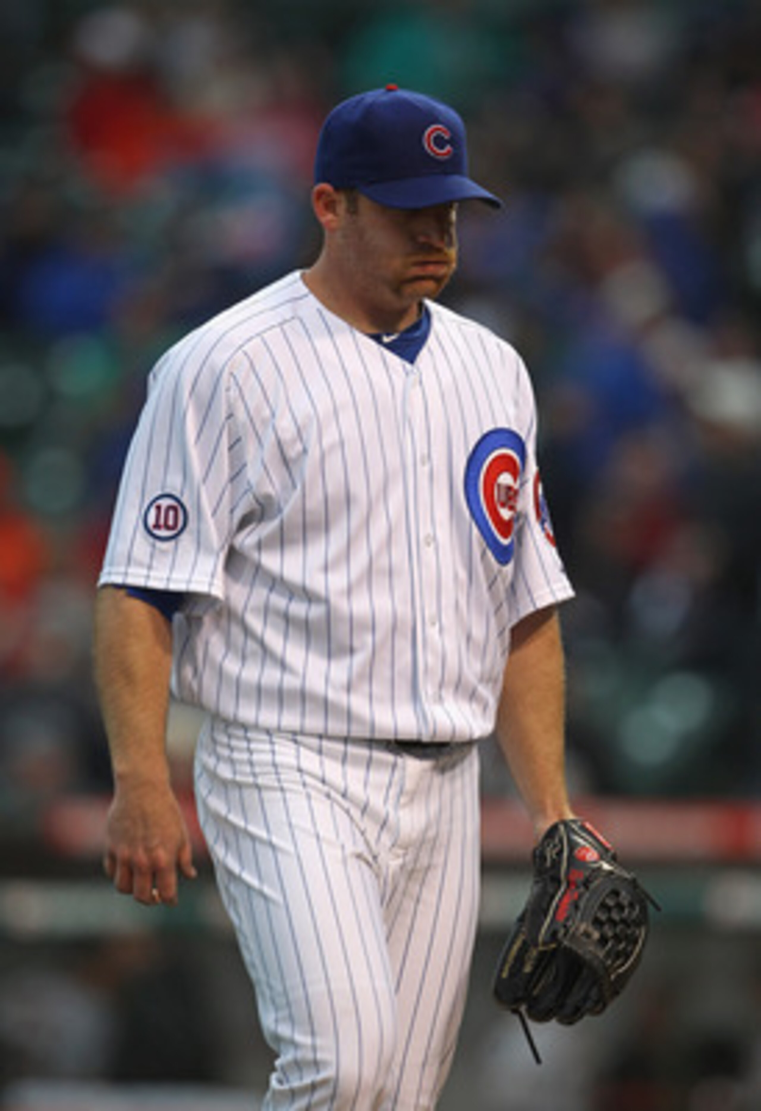 CHICAGO, IL - MAY 13: Ryan Dempster #46 of the Chicago Cubs walks off of the field after pitching in the 5th inning against the San Francisco Giants at Wrigley Field on May 13, 2011 in Chicago, Illinois.  The Cubs defeated the Giants 11-4. (Photo by Jonat