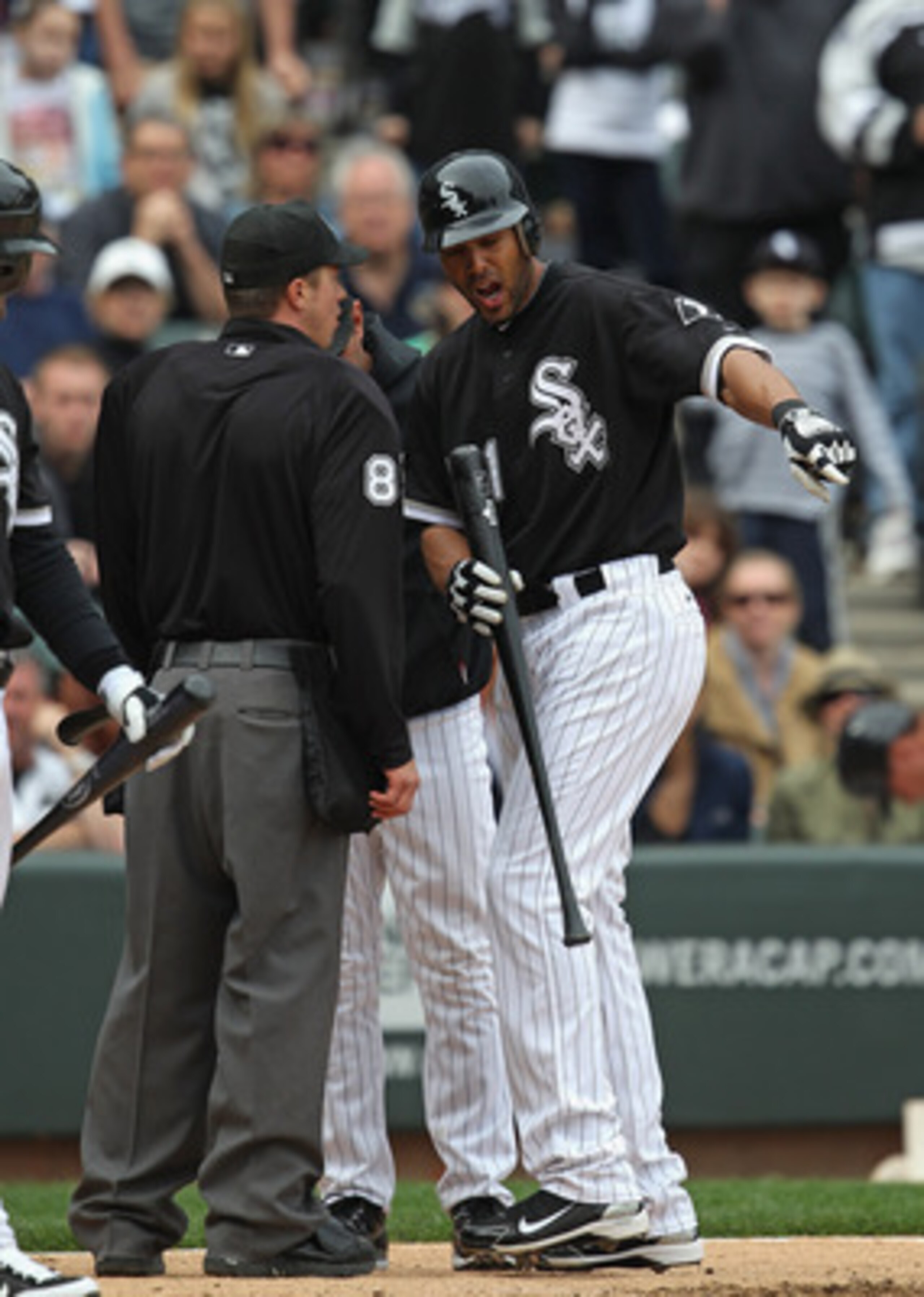 CHICAGO, IL - MAY 01: Alex Rios #51 of the Chicago White Sox argues with home plate umpire Cory Blaser #89 after being called out on stikes in the 9th inning against the Baltimore Orioles at U.S. Cellular Field on May 1, 2011 in Chicago, Illinois. The Ori