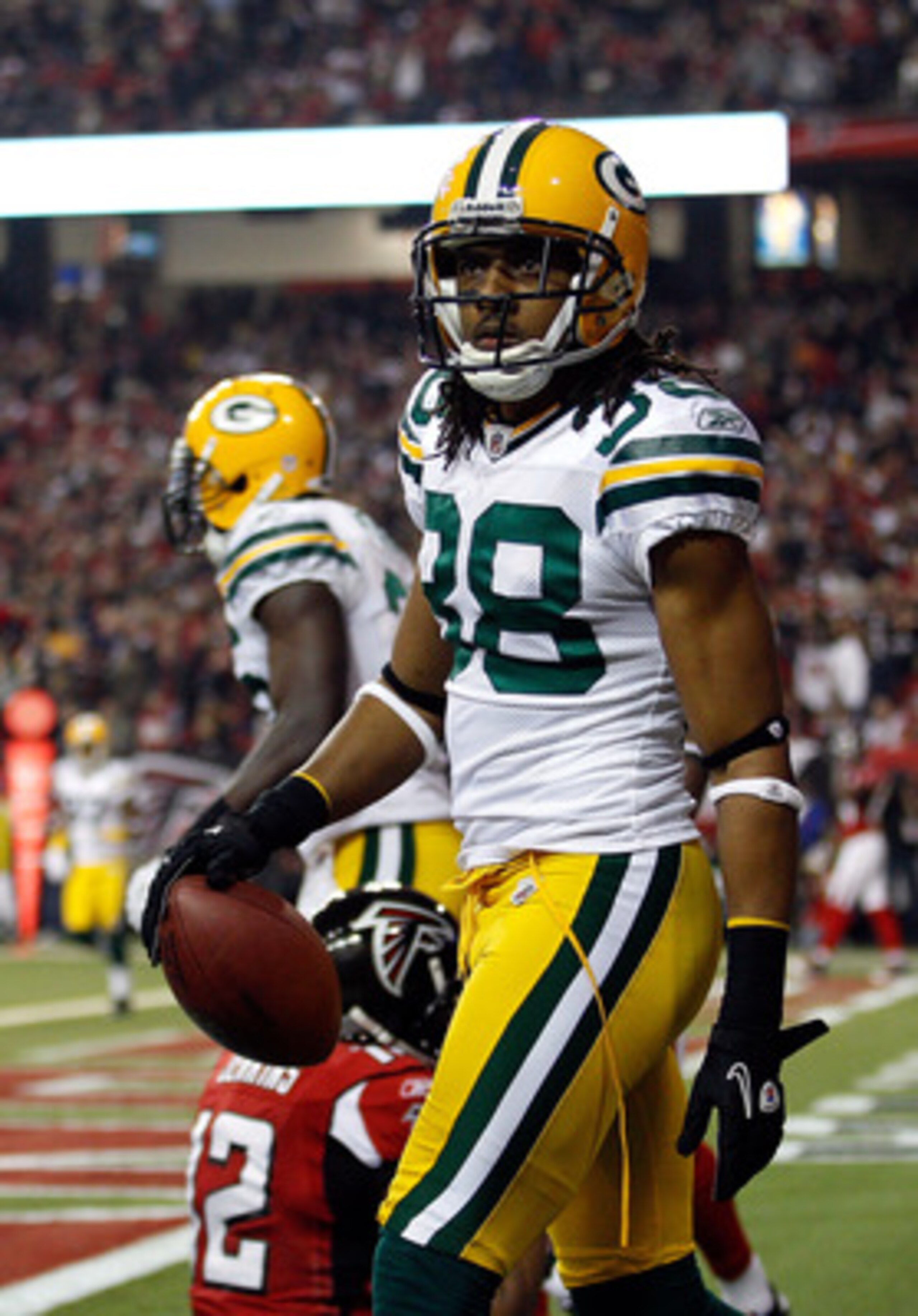 ATLANTA, GA - JANUARY 15:  Tramon Williams #38 of the Green Bay Packers reacts after he intercepted a pass in the endzone against the Atlanta Falcons during their 2011 NFC divisional playoff game at Georgia Dome on January 15, 2011 in Atlanta, Georgia.  (