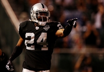 OAKLAND, CA - AUGUST 13:  Safety Michael Huff #24 of the Oakland Raiders celebrates after making an interception against the Dallas Cowboys during the preseason game at Oakland-Alameda County Coliseum on August 13, 2009 in Oakland, California. (Photo by J
