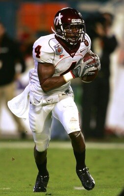 MIAMI - JANUARY 03:  Eddie Royal #4 of the Virginia Tech Hokies carries the ball during the FedEx Orange Bowl against the Kansas Jayhawks at Dolphin Stadium on January 3, 2008 in Miami, Florida.  Kansas defeated Virginia Tech 24-21.  (Photo by Matthew Sto