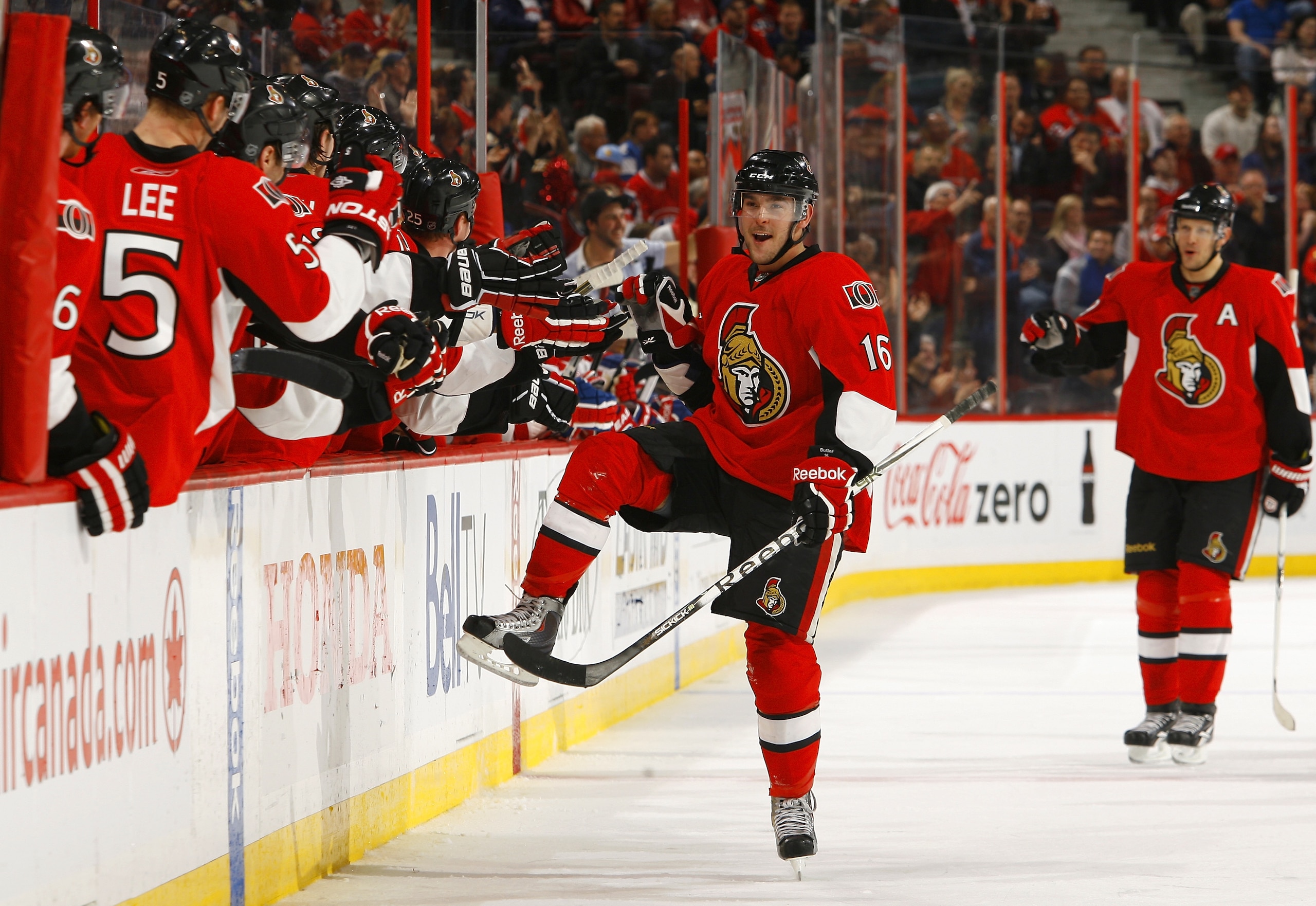 OTTAWA, CANADA - APRIL 07:  Bobby Butler #16 of the Ottawa Senators celebrates his goal against the Montreal Canadiens with his teammates on the bench in a game at Scotiabank Place on April 7, 2011 in Ottawa, Canada.  (Photo by Phillip MacCallum/Getty Ima