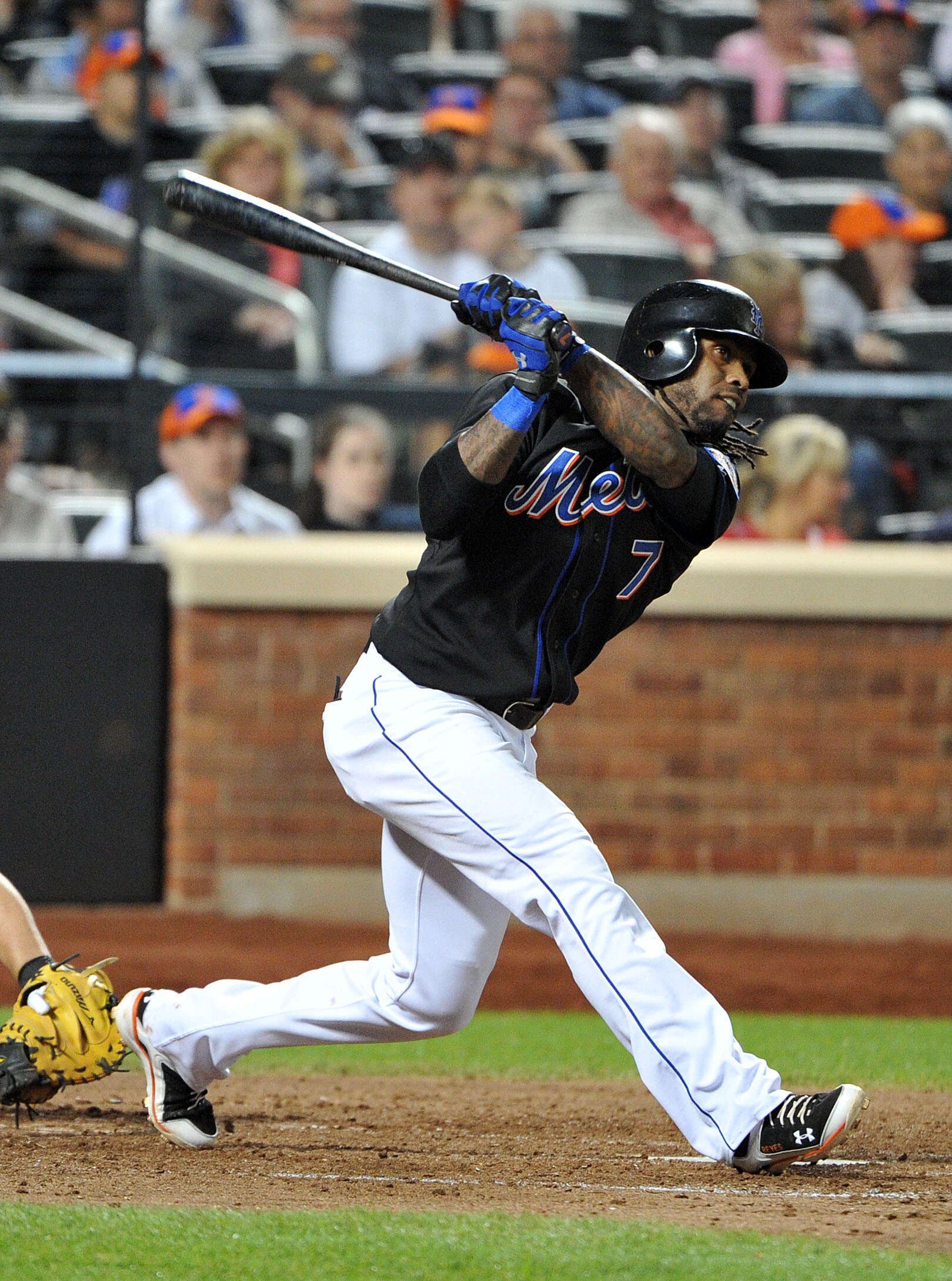 NEW YORK, NY - JUNE 04: Jose Reyes #7 of the New York Mets watches his three RBI triple in the bottom of the seventh inning against the Atlanta Braves at Citi Field on June 4, 2011 in the Flushing neighborhood of the Queens borough of New York City. (Phot